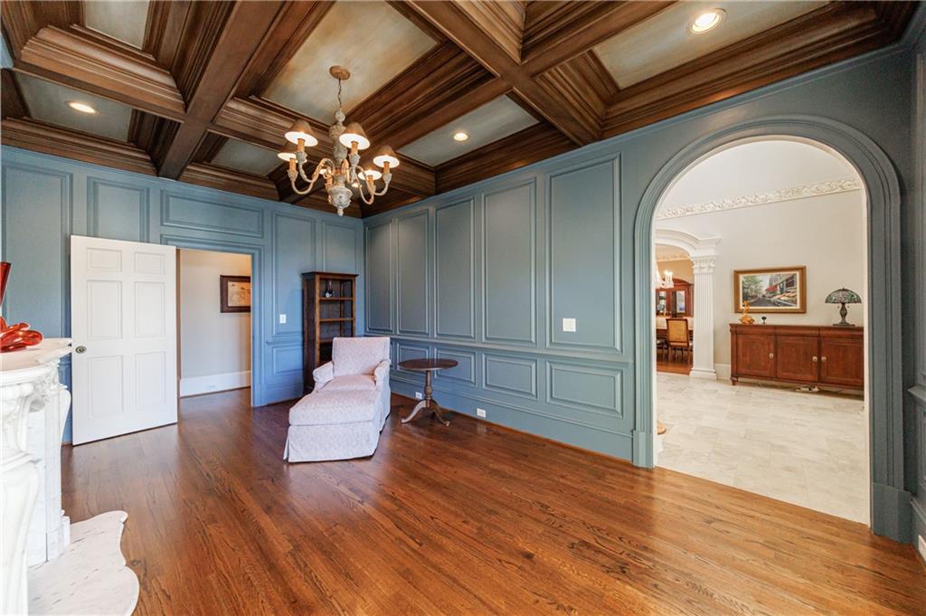 9390 Colonnade Trail Alpharetta, GA 30022 - Photo 10 of 122 a living room with furniture and a chandelier