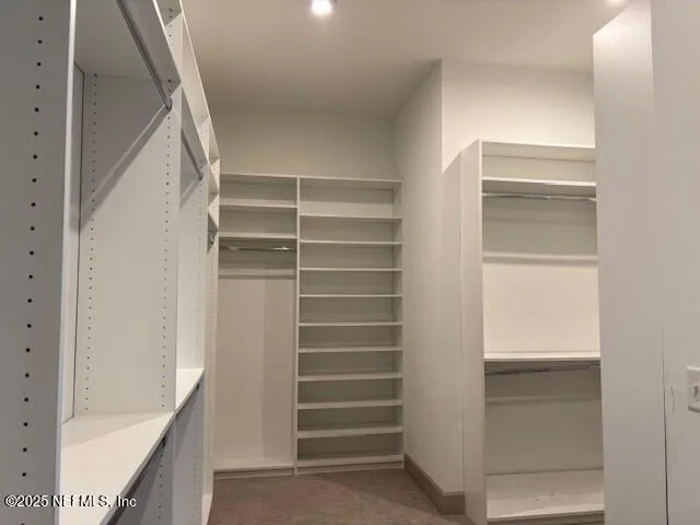 a bathroom with a bathtub and a sink