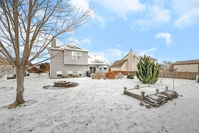 a view of a backyard of a house