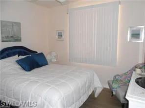 a room with furniture and flat screen tv