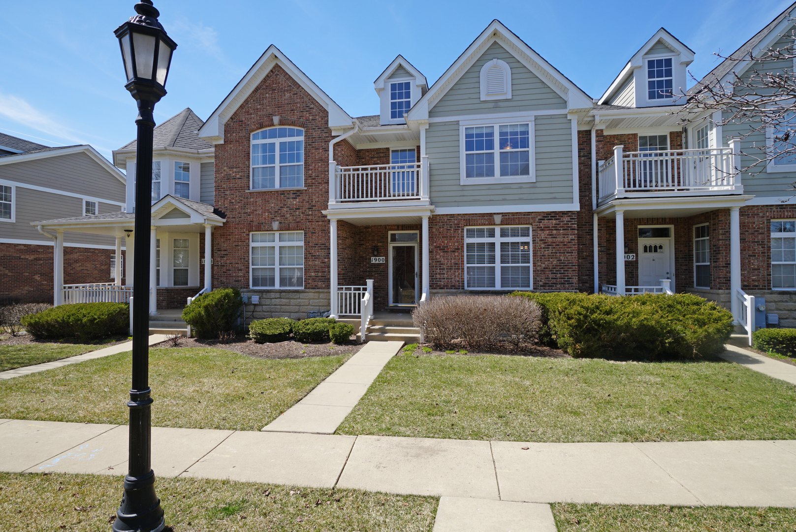 1900 Keystone Place Schaumburg, IL 60193 - Photo 1 of 1 a front view of a house with a yard