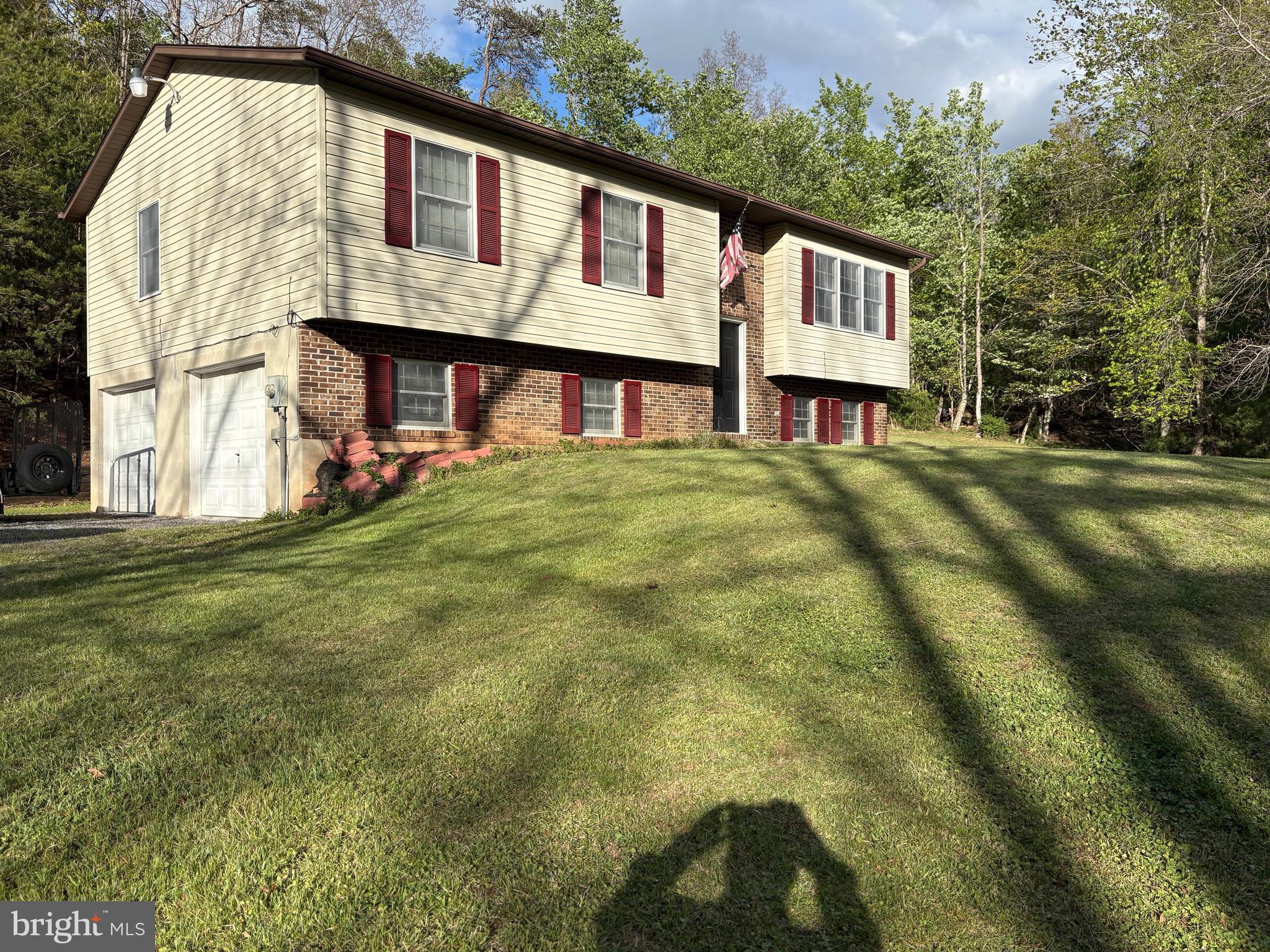 2865 Capon Springs Road High View, WV 26808 - Photo 22 of 34 a front view of a house with garden