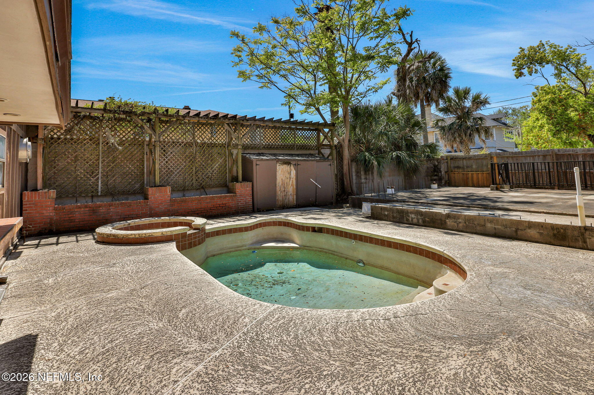 2160 Oak Street Jacksonville, FL 32204 - Photo 115 of 143 a view of a swimming pool with a backyard