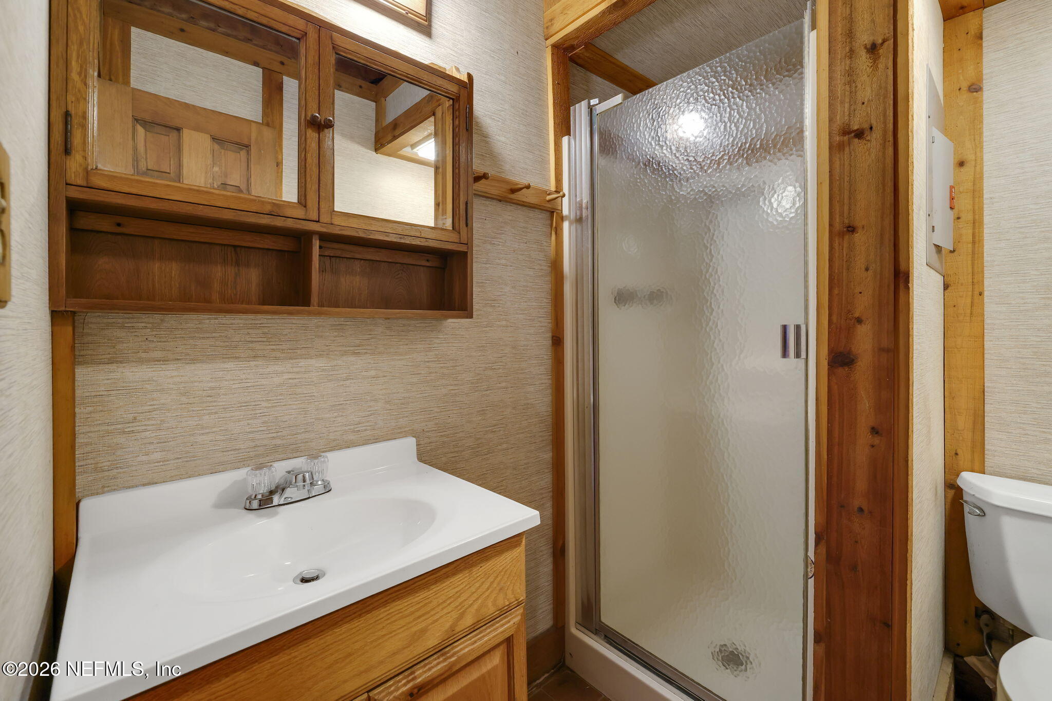 2160 Oak Street Jacksonville, FL 32204 - Photo 129 of 143 a bathroom with a sink and a shower