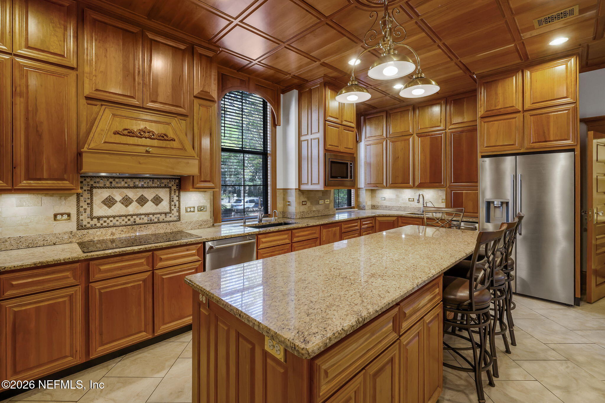 2160 Oak Street Jacksonville, FL 32204 - Photo 15 of 143 a kitchen with stainless steel appliances granite countertop a sink a counter space and cabinets