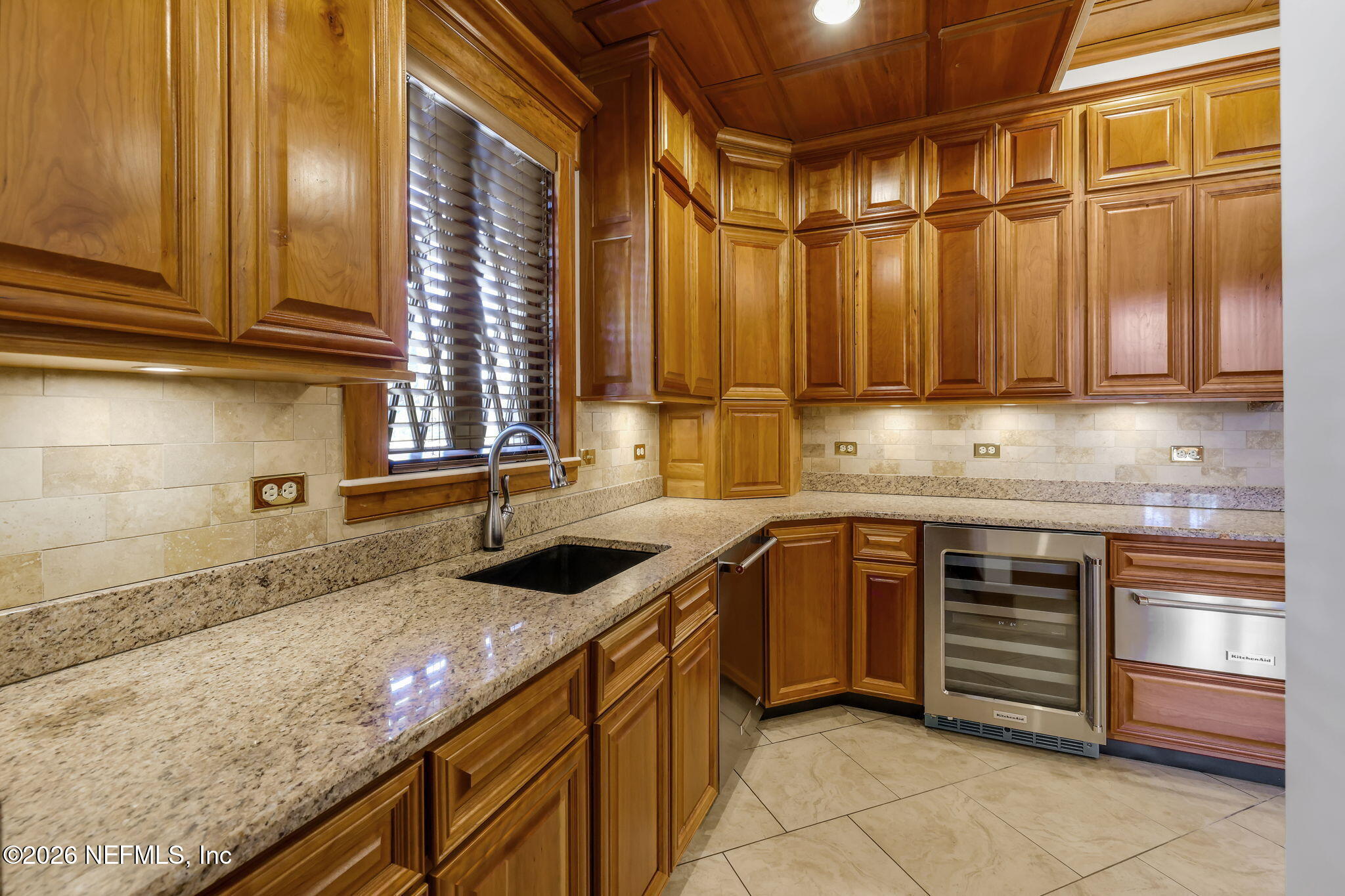 2160 Oak Street Jacksonville, FL 32204 - Photo 19 of 143 a kitchen with granite countertop a sink and cabinets