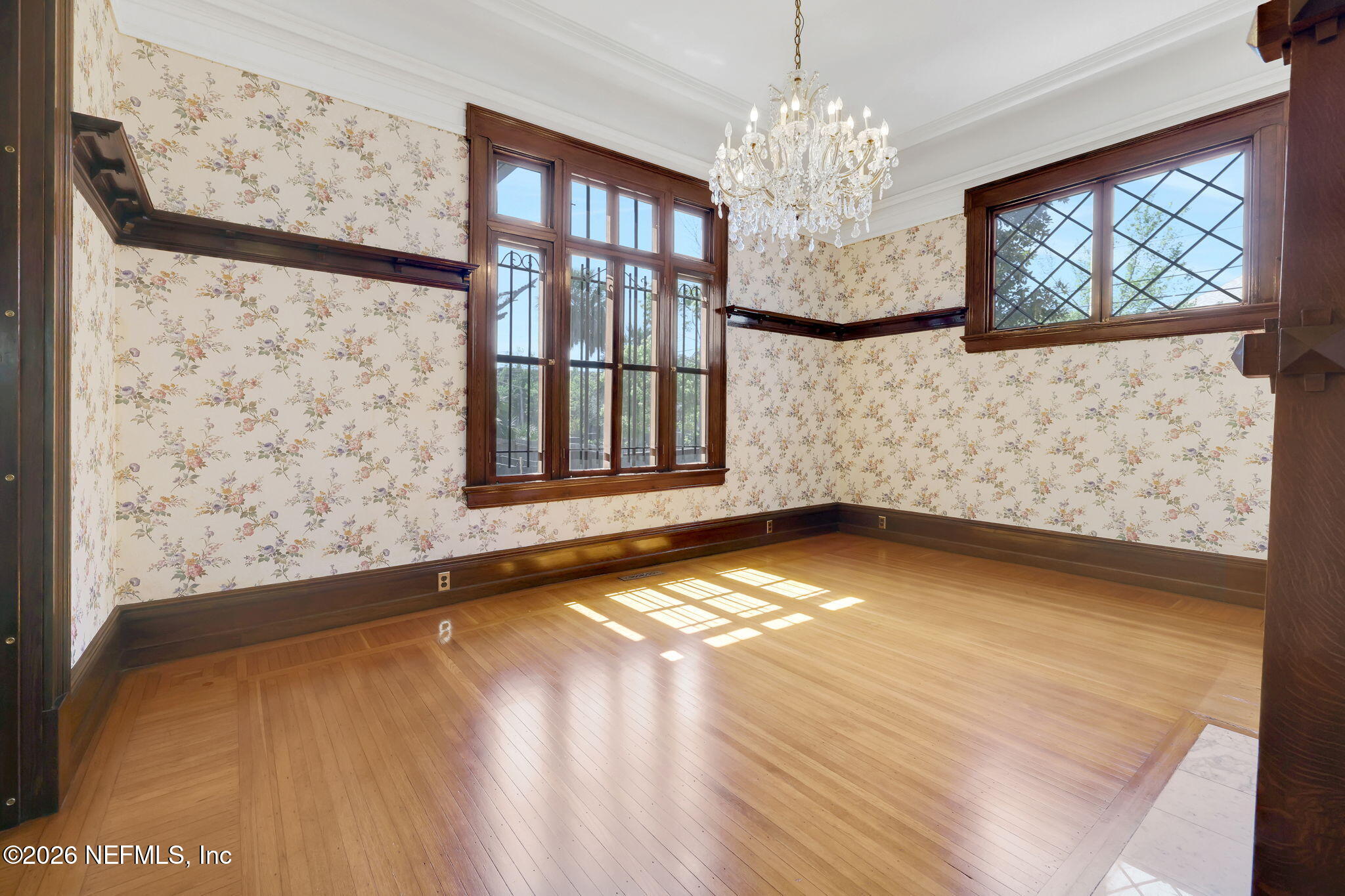 2160 Oak Street Jacksonville, FL 32204 - Photo 28 of 143 a view of an empty room with a window and wooden floor