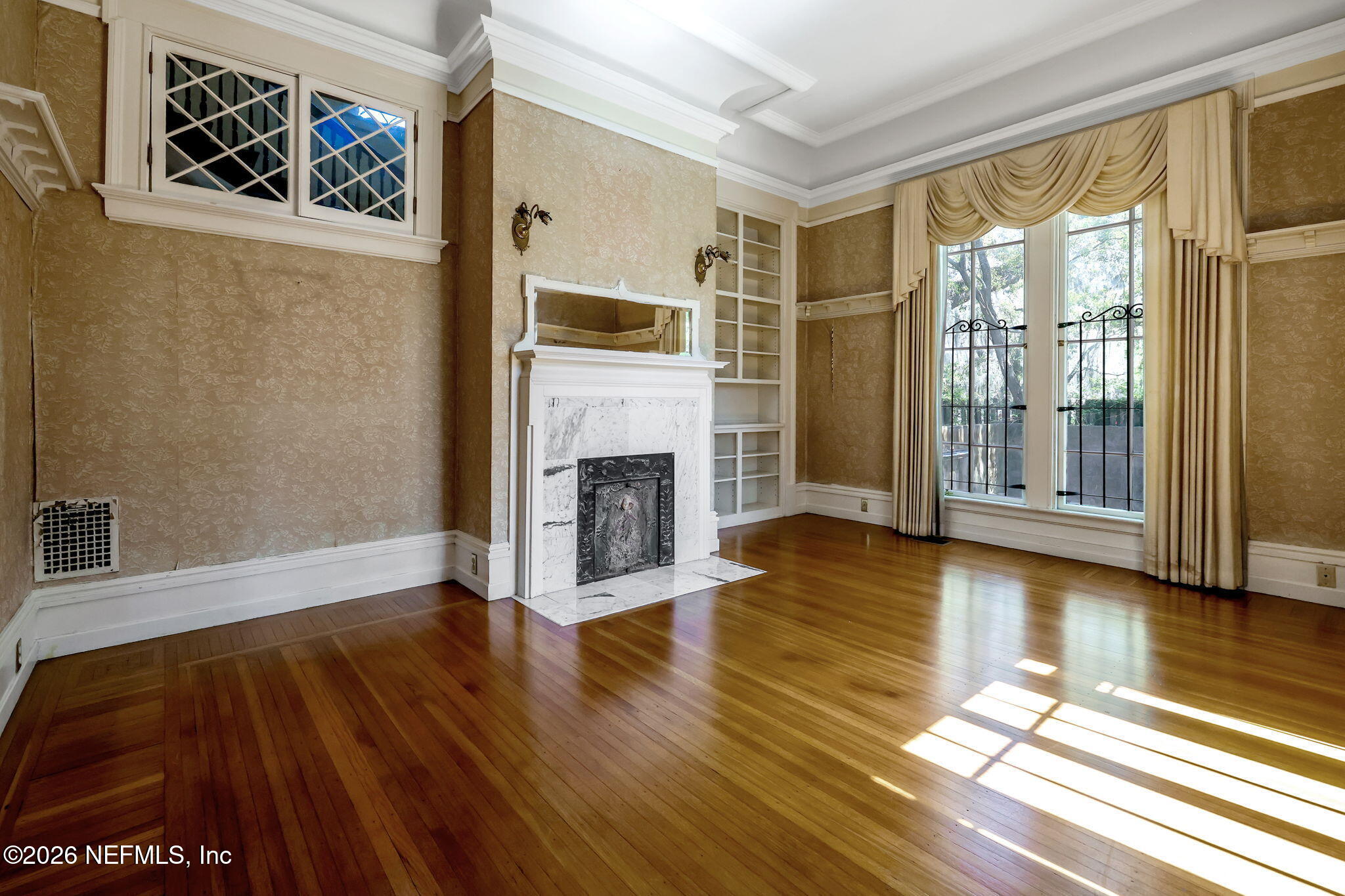 2160 Oak Street Jacksonville, FL 32204 - Photo 35 of 143 a view of a livingroom with wooden floor and a fireplace