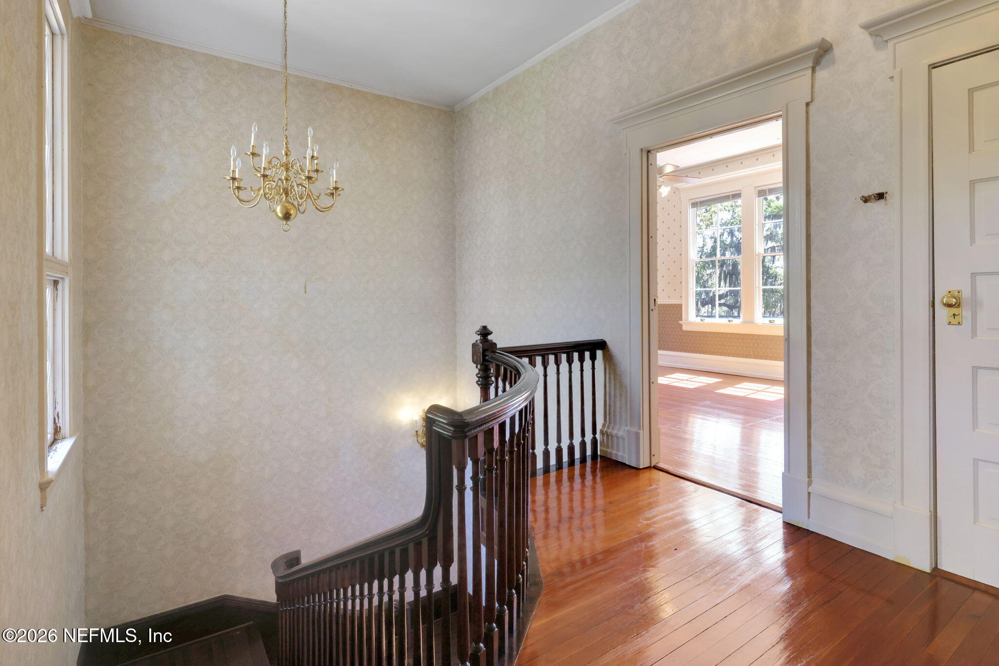 2160 Oak Street Jacksonville, FL 32204 - Photo 44 of 143 a view of a hallway with wooden floor and a window