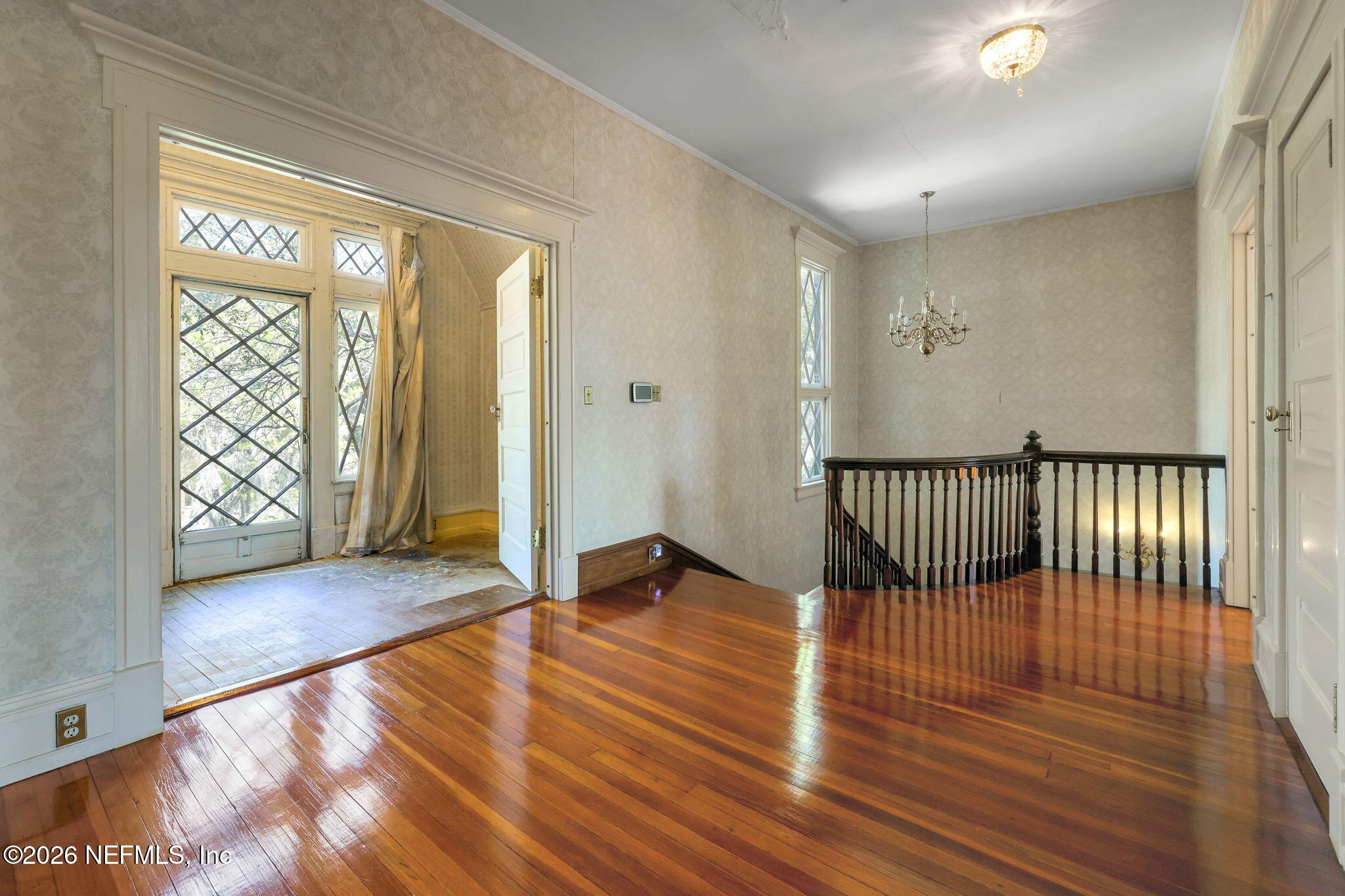 2160 Oak Street Jacksonville, FL 32204 - Photo 46 of 143 a view of a room with wooden floor and large window