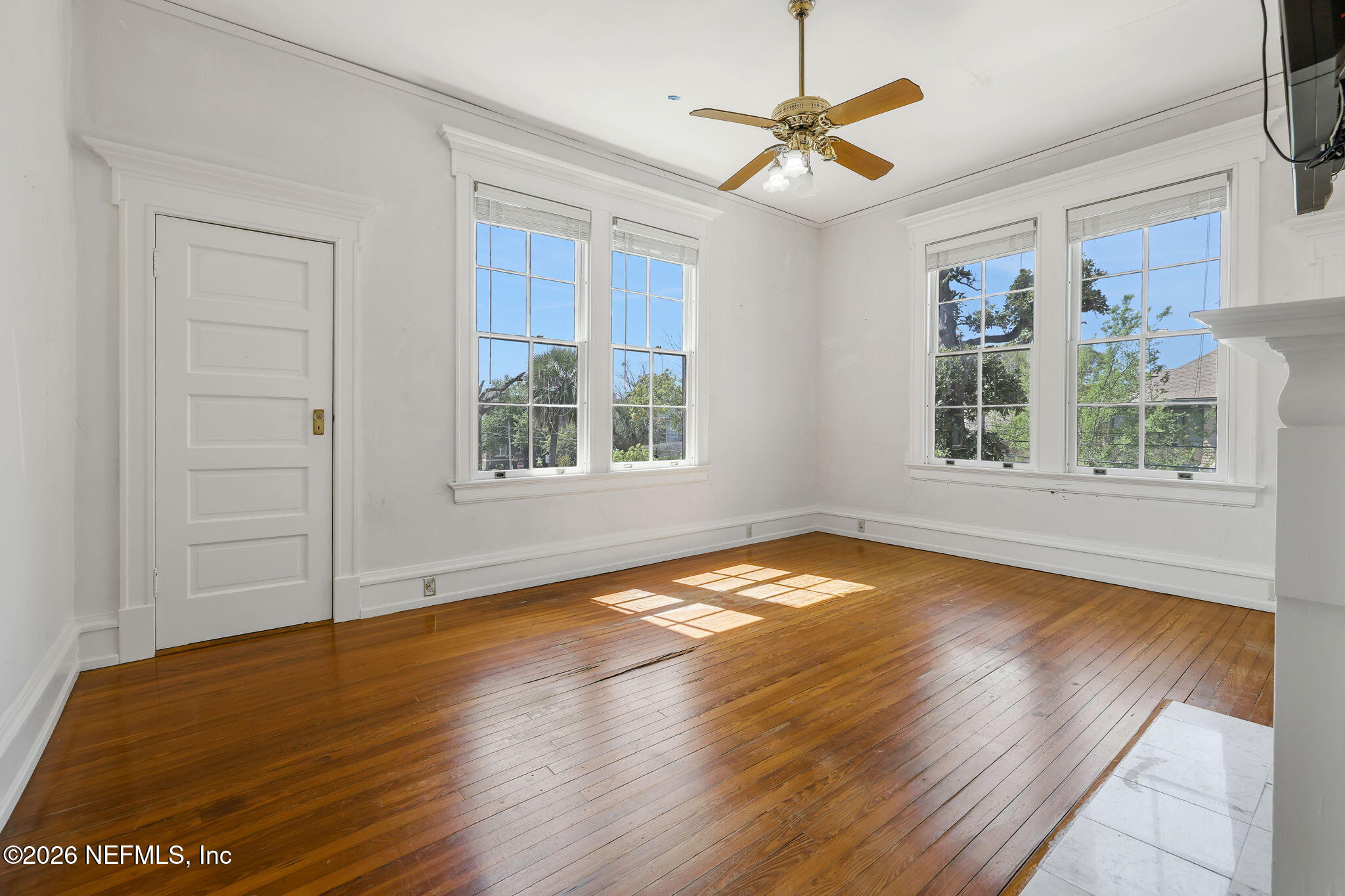 2160 Oak Street Jacksonville, FL 32204 - Photo 65 of 143 a view of empty room with wooden floor and fan