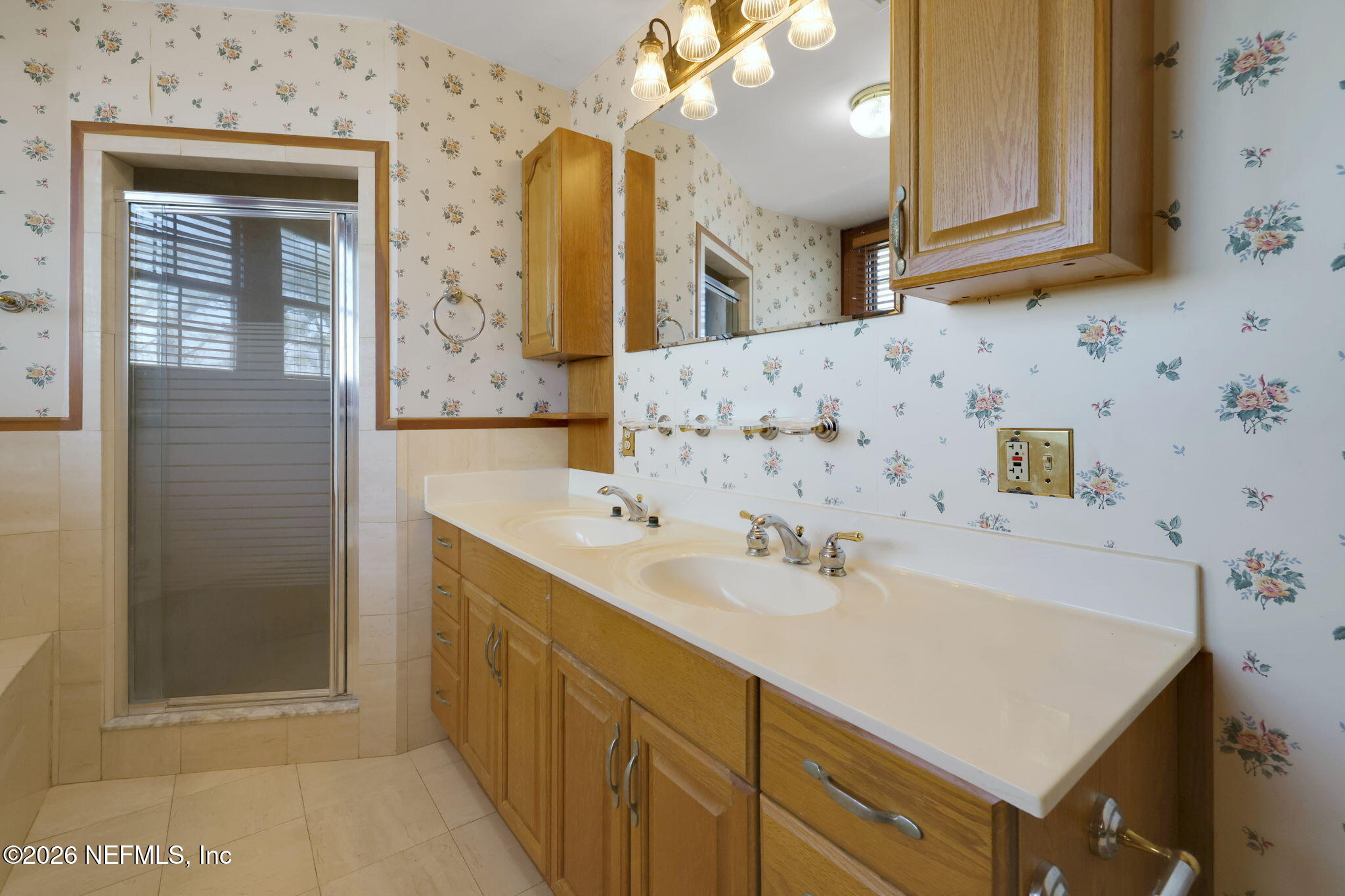 2160 Oak Street Jacksonville, FL 32204 - Photo 95 of 143 a bathroom with a sink and a mirror