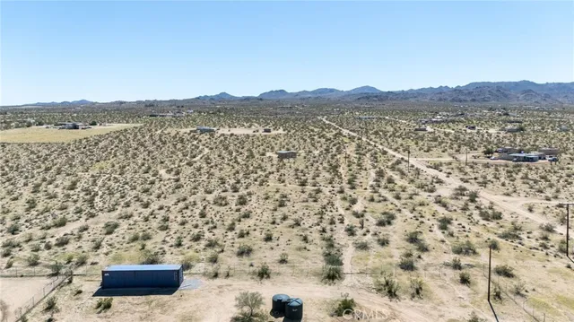 a view of a room that has a large window