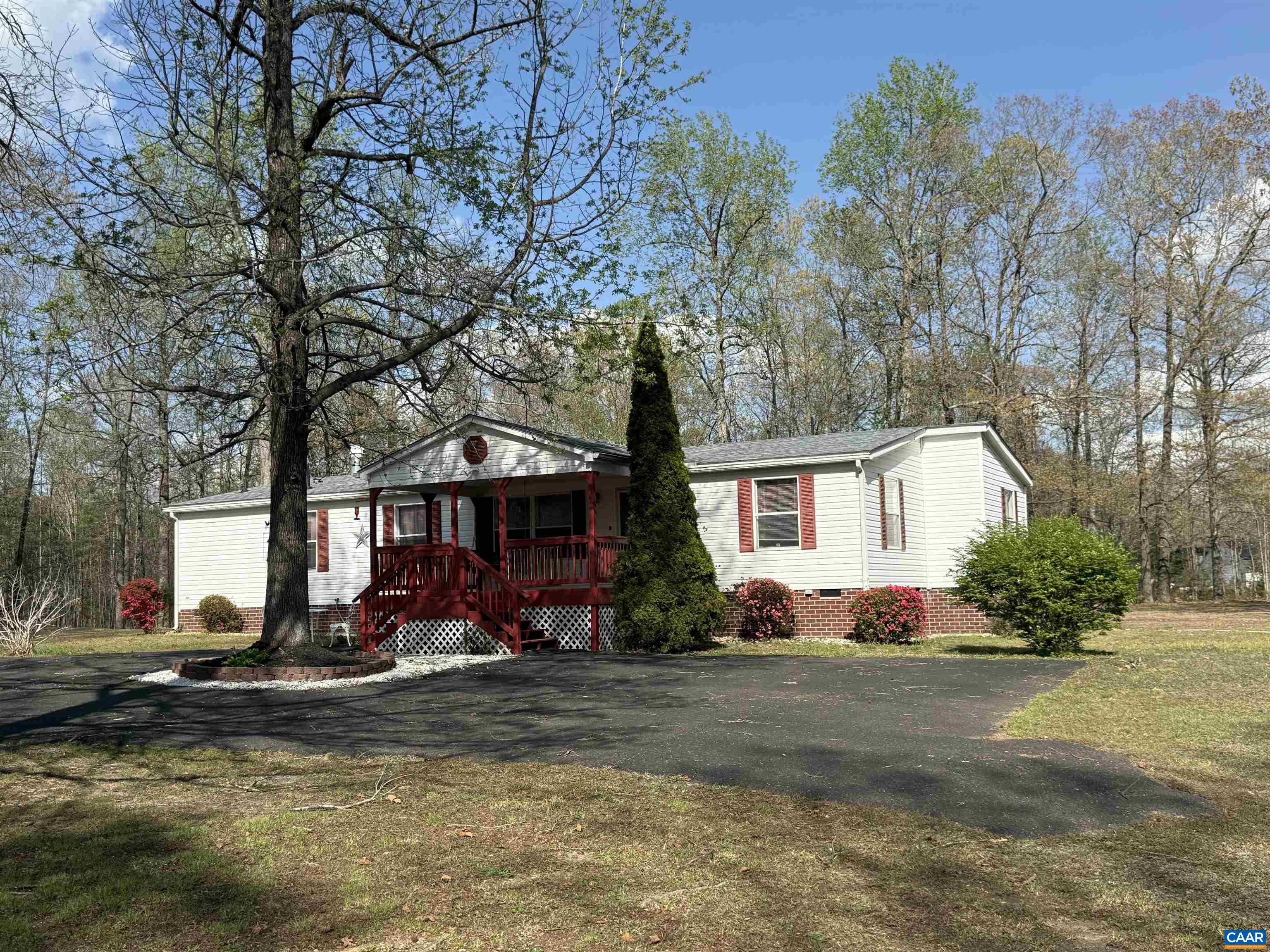 220 Chalklevel Road Louisa, VA 23093 - Photo 1 of 43 a front view of a house with garden