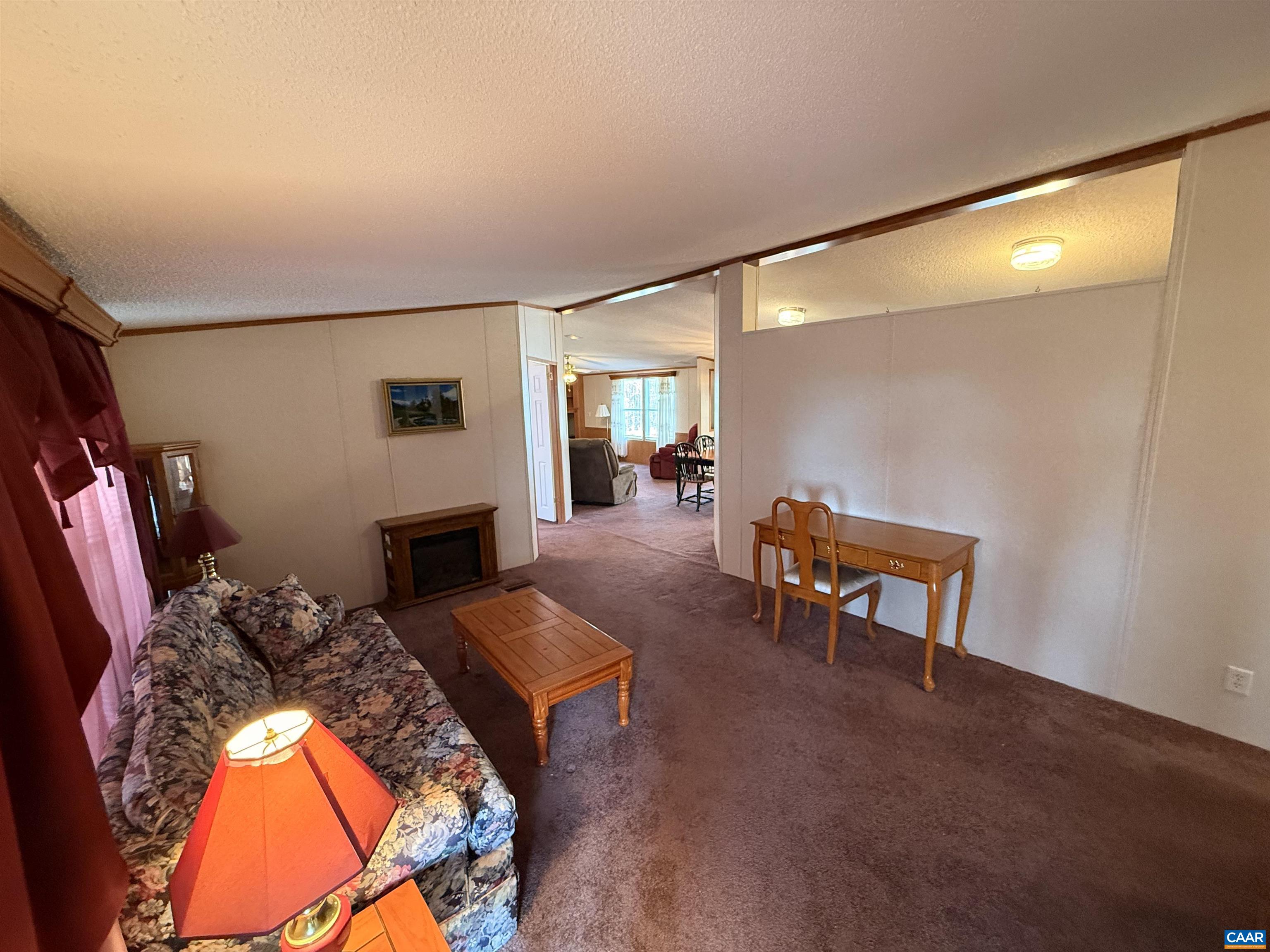 220 Chalklevel Road Louisa, VA 23093 - Photo 5 of 43 a living room with furniture and a fireplace