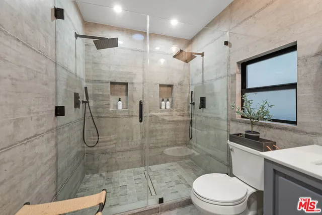 a view of washer and dryer in a utility room