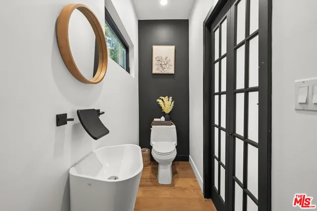 a view of a lobby with a couch and a fire pit