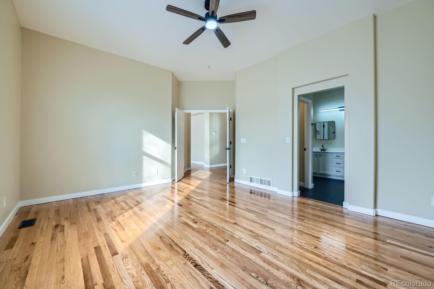 6596 Silverleaf Avenue Firestone, CO 80504 - Photo 11 of 26 a view of empty room with wooden floor