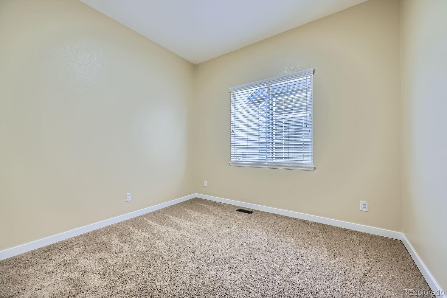 6596 Silverleaf Avenue Firestone, CO 80504 - Photo 14 of 26 an empty room with a window
