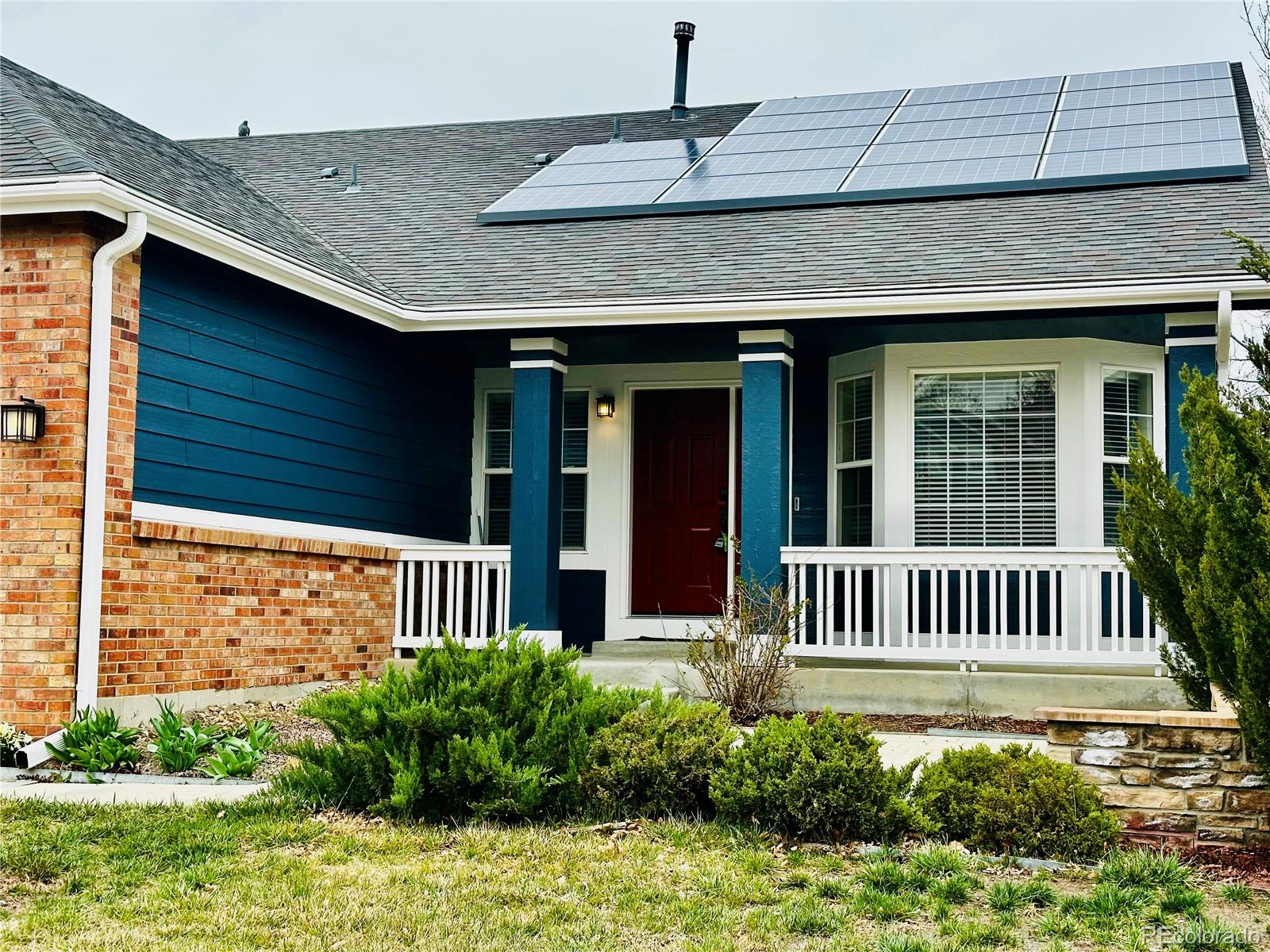 6596 Silverleaf Avenue Firestone, CO 80504 - Photo 2 of 26 a front view of a house having yard