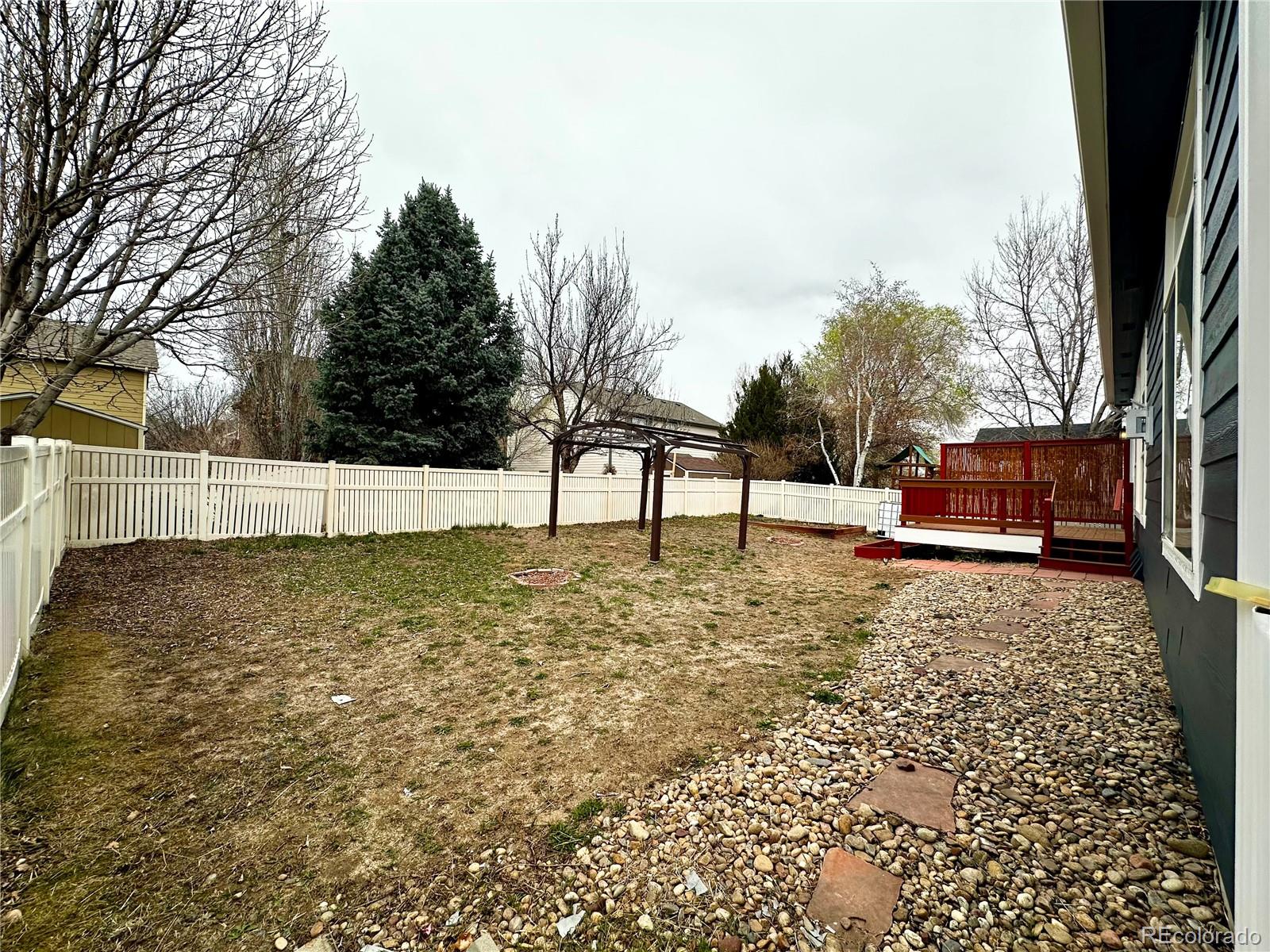 6596 Silverleaf Avenue Firestone, CO 80504 - Photo 26 of 26 a view of backyard with trees