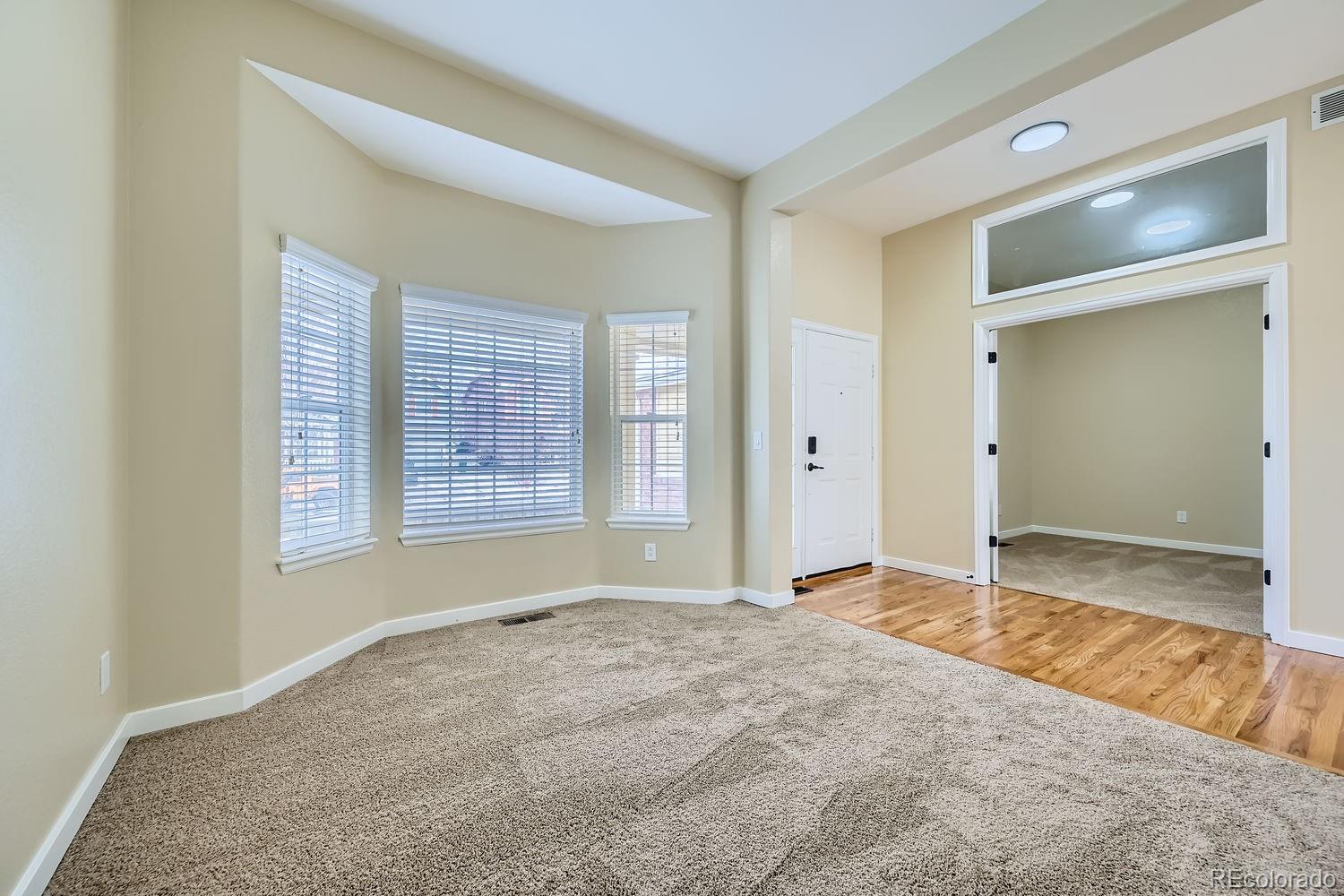 6596 Silverleaf Avenue Firestone, CO 80504 - Photo 4 of 26 a view of an empty room with window and bathroom