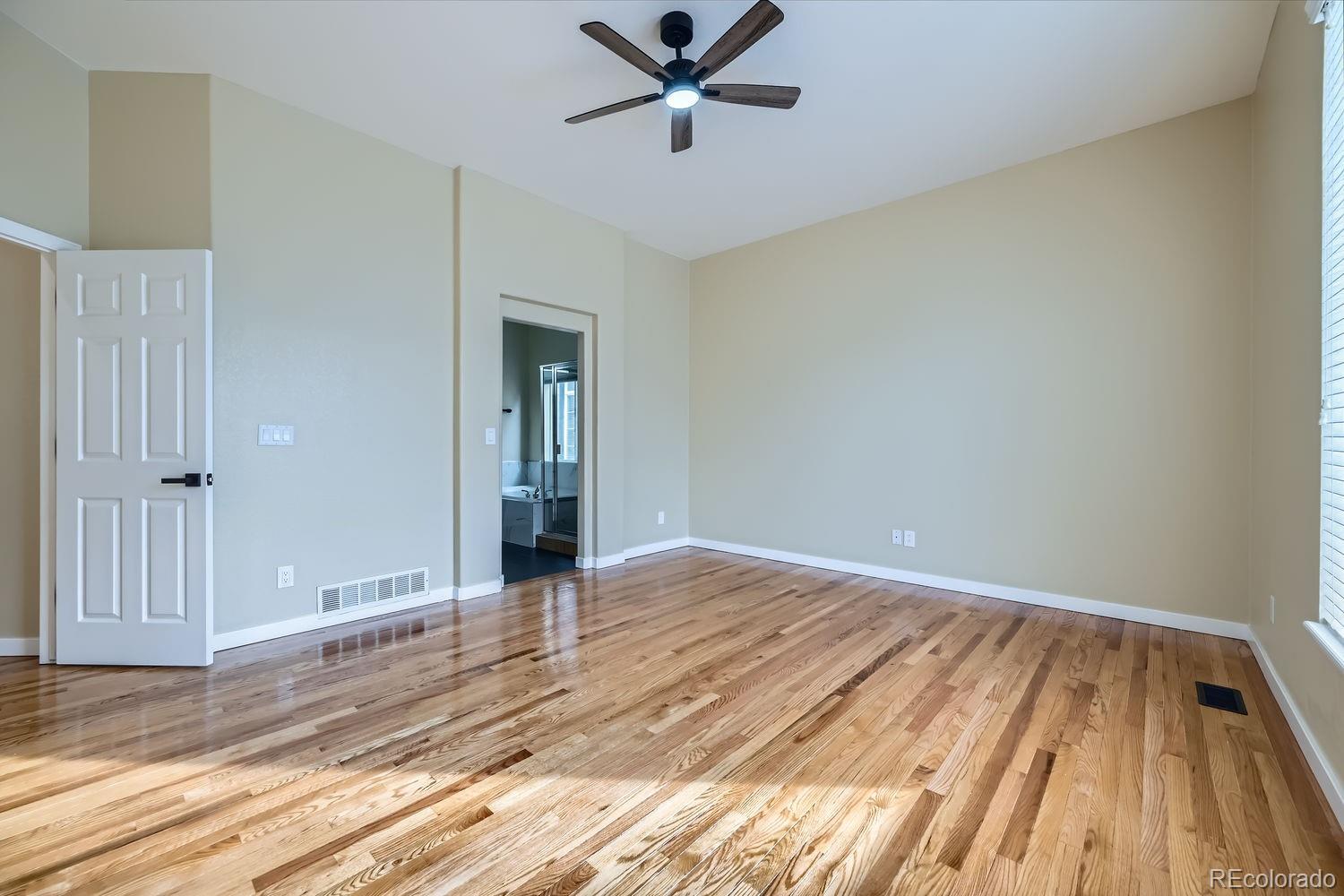 6596 Silverleaf Avenue Firestone, CO 80504 - Photo 10 of 26 wooden floor in an empty room