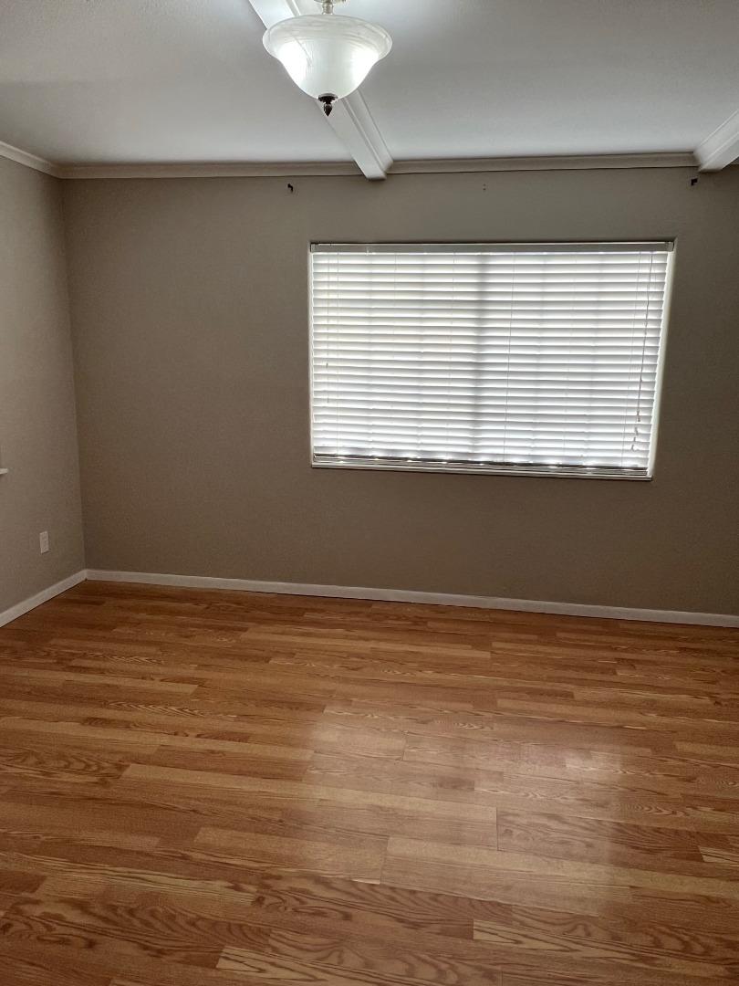 2829 Hilltop Road Concord, CA 94520 - Photo 14 of 20 a view of a room with wooden floor and a window
