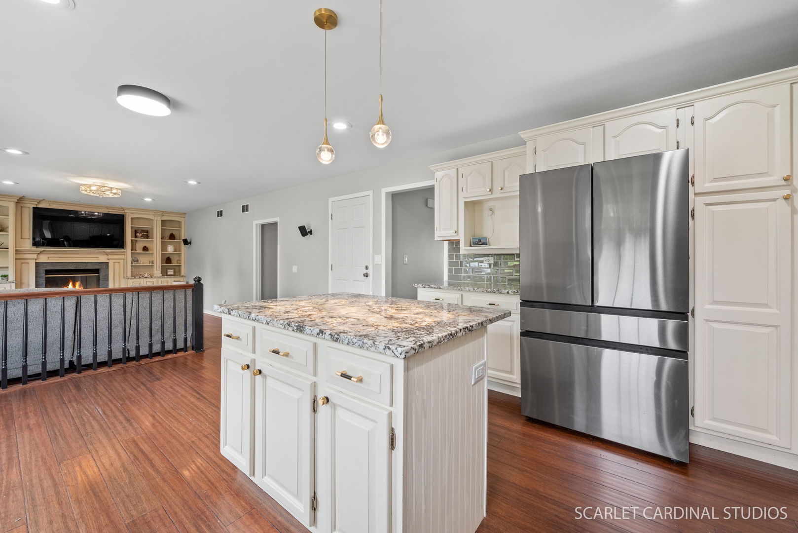 12N619 Jackson Drive Elgin, IL 60124 - Photo 12 of 50 a kitchen with stainless steel appliances granite countertop a refrigerator a stove and a wooden floors