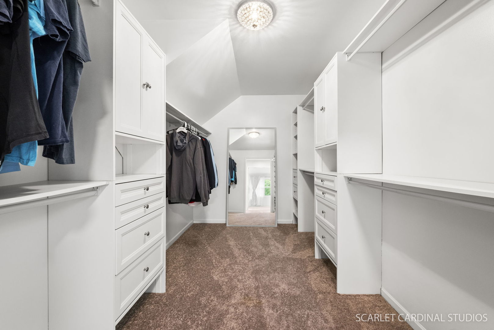 12N619 Jackson Drive Elgin, IL 60124 - Photo 23 of 50 a view of walk in closet with clothes