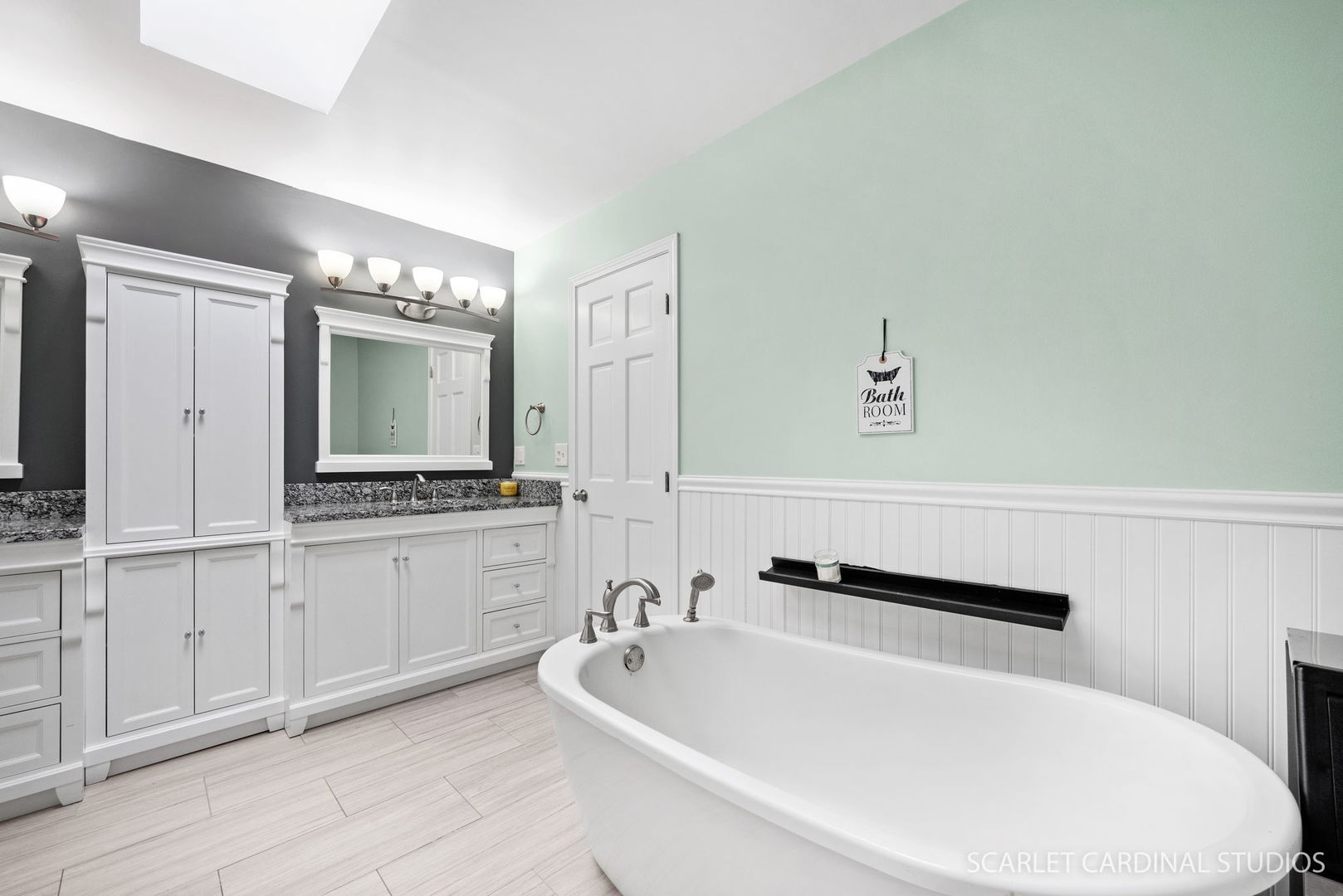 12N619 Jackson Drive Elgin, IL 60124 - Photo 25 of 50 a bathroom with a bathtub a mirror a double vanity sink and vanity