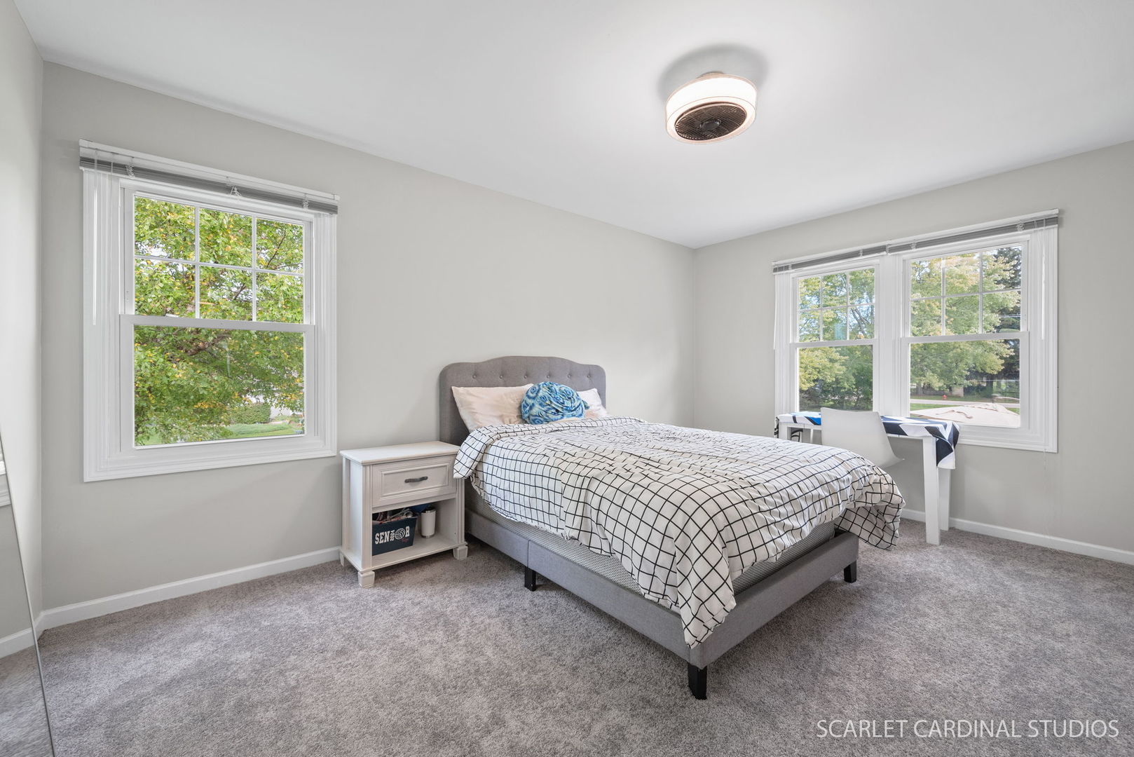 12N619 Jackson Drive Elgin, IL 60124 - Photo 31 of 50 a bed sitting in a bedroom next to a window