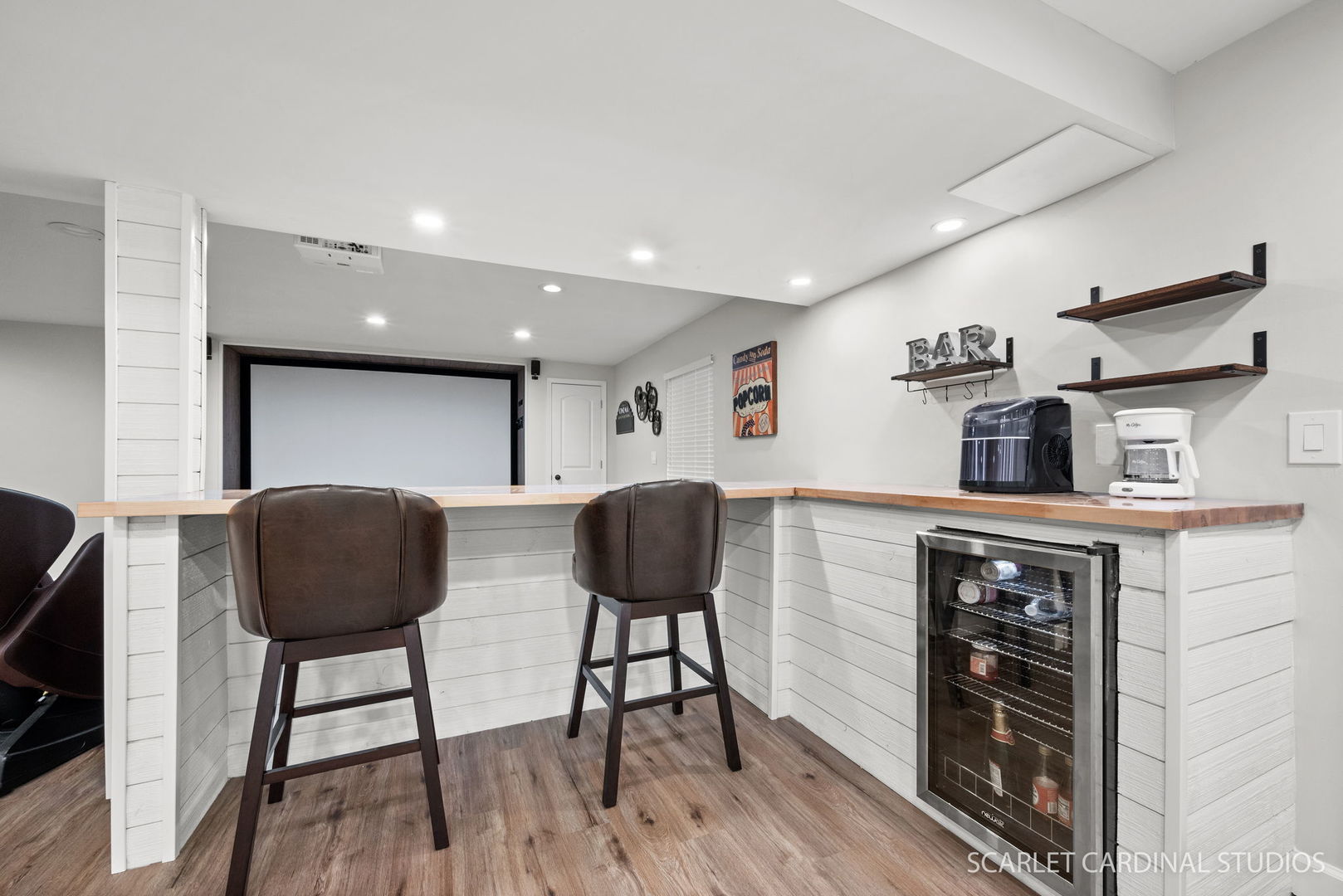 12N619 Jackson Drive Elgin, IL 60124 - Photo 34 of 50 a kitchen with stainless steel appliances granite countertop a refrigerator a stove a sink dishwasher and a dining table with wooden floor