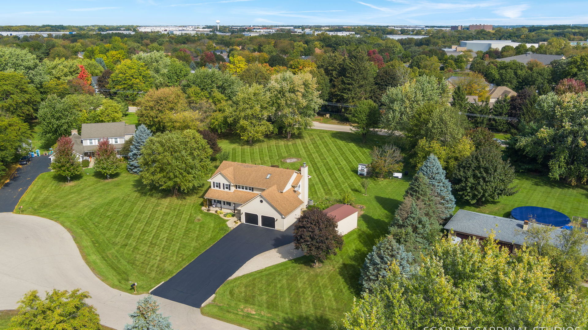 12N619 Jackson Drive Elgin, IL 60124 - Photo 4 of 50 an aerial view of a house with a yard basket ball court and outdoor seating