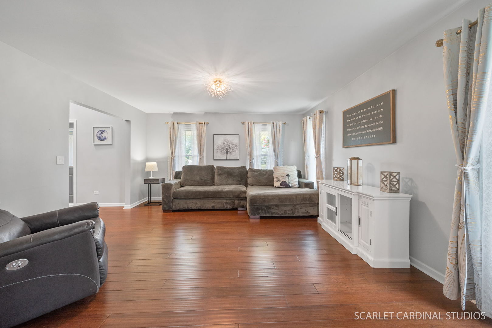 12N619 Jackson Drive Elgin, IL 60124 - Photo 9 of 50 a living room with furniture and a wooden floor