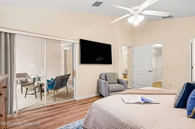 a patio with yard table and chairs