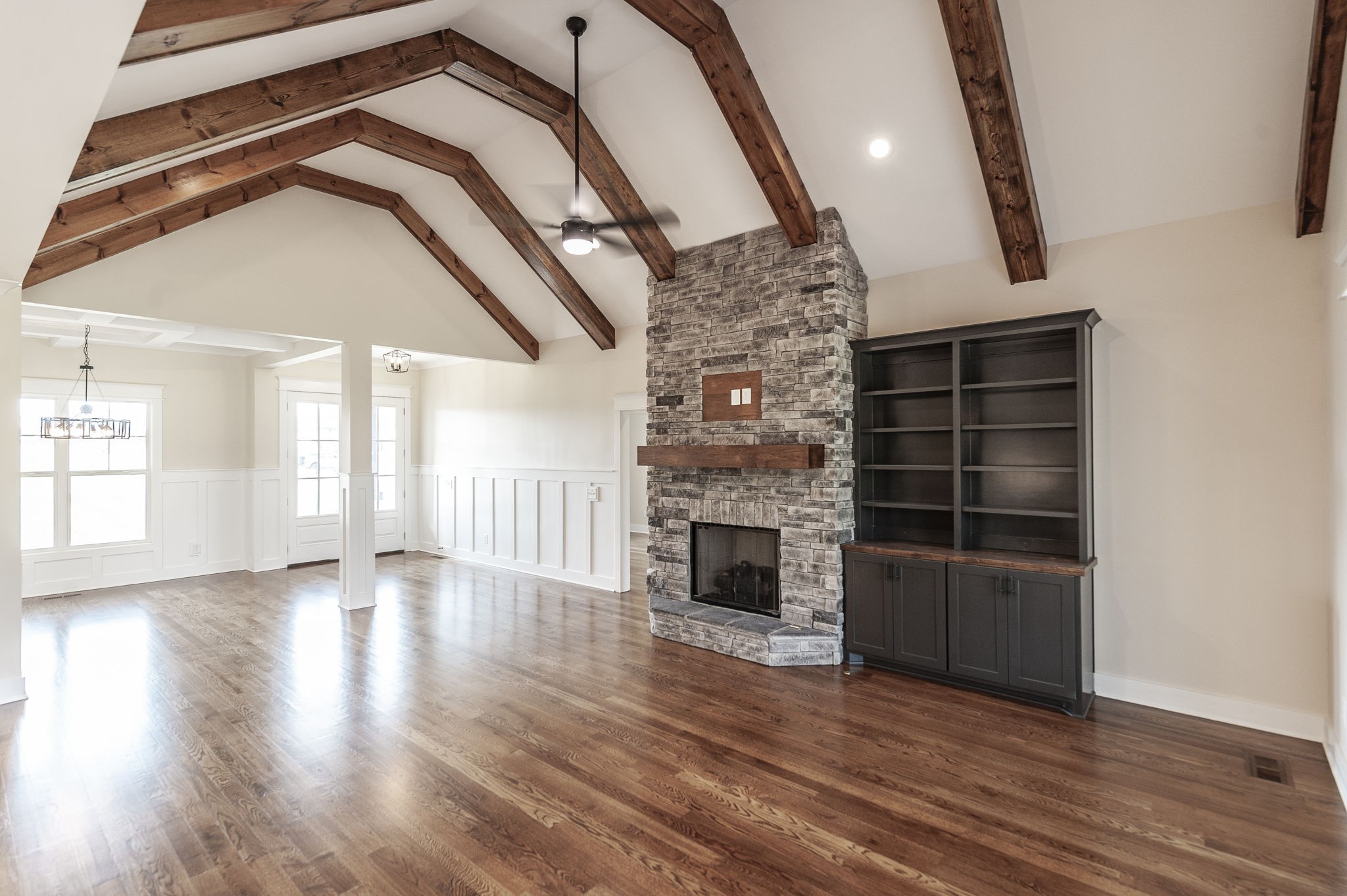 1060 Millbrook Way Gallatin, TN 37066 - Photo 18 of 79 an empty room with wooden floor and fireplace