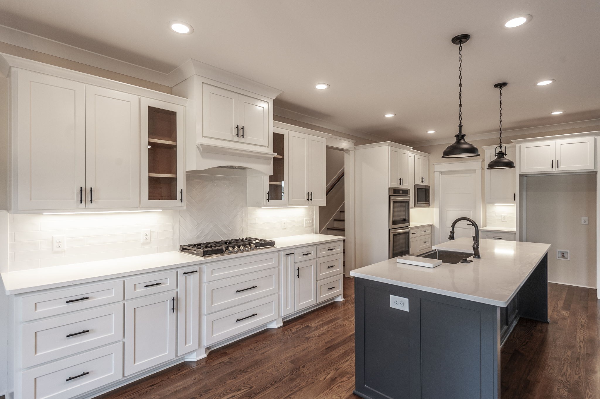 1060 Millbrook Way Gallatin, TN 37066 - Photo 23 of 79 a kitchen with white cabinets and sink