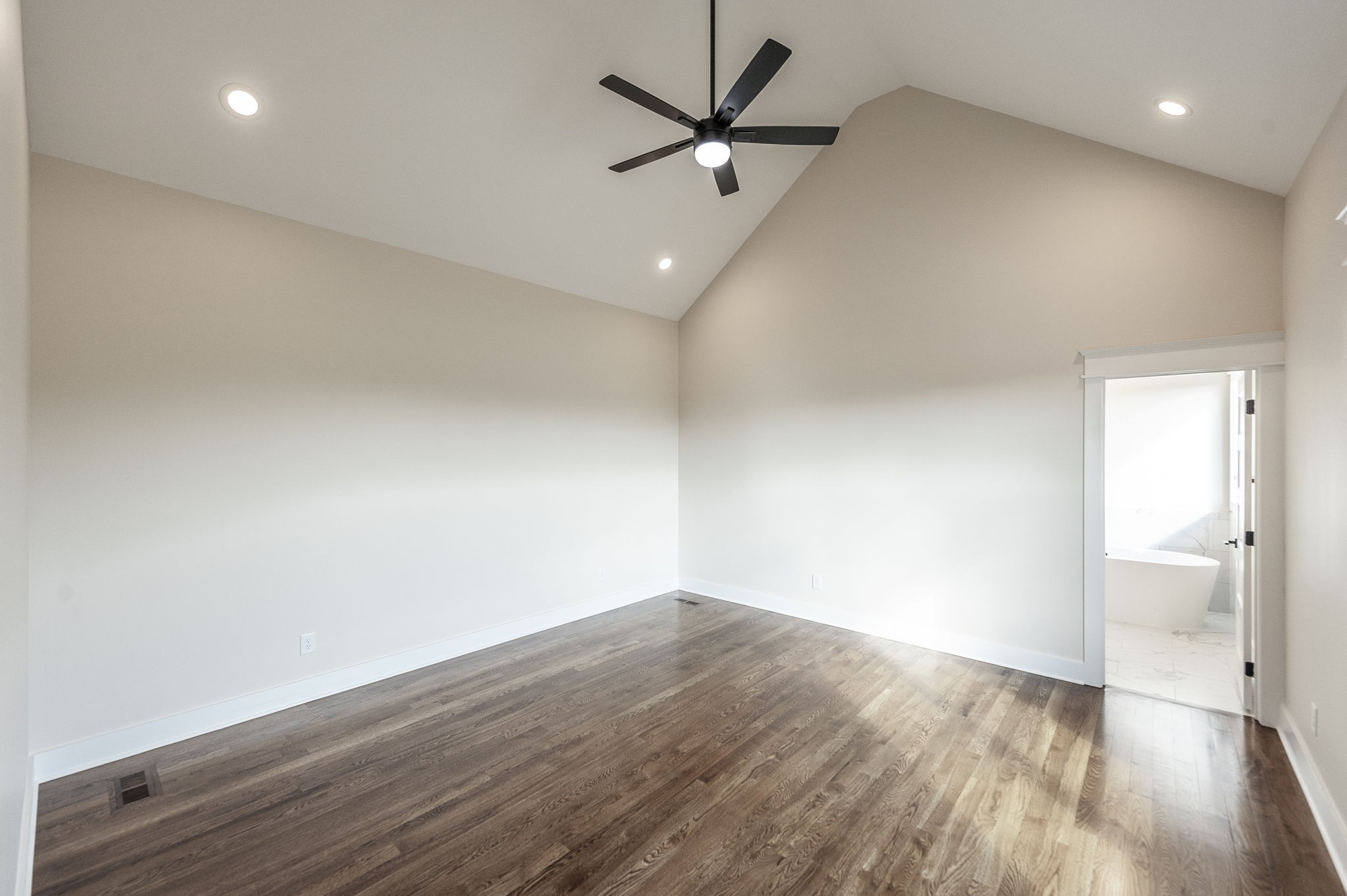1060 Millbrook Way Gallatin, TN 37066 - Photo 32 of 79 an empty room with wooden floor and a ceiling fan