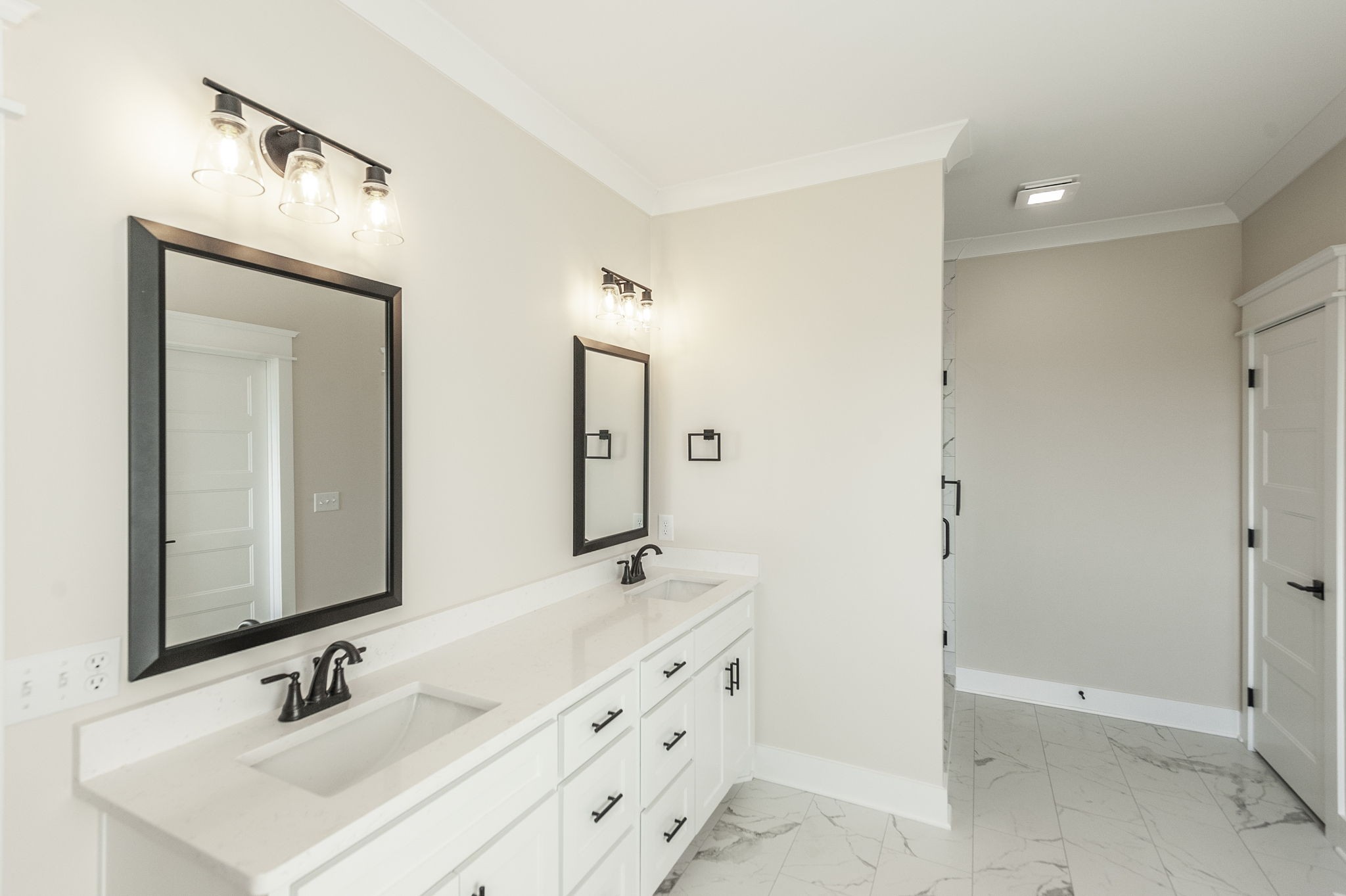 1060 Millbrook Way Gallatin, TN 37066 - Photo 38 of 79 a bathroom with double vanity sink and a mirror