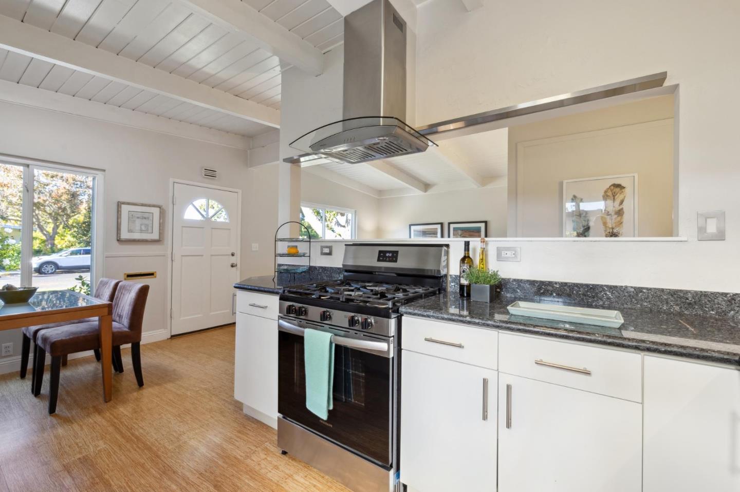 741 Emily Drive Mountain View, CA 94043 - Photo 13 of 30 a kitchen with stainless steel appliances granite countertop a stove and a sink