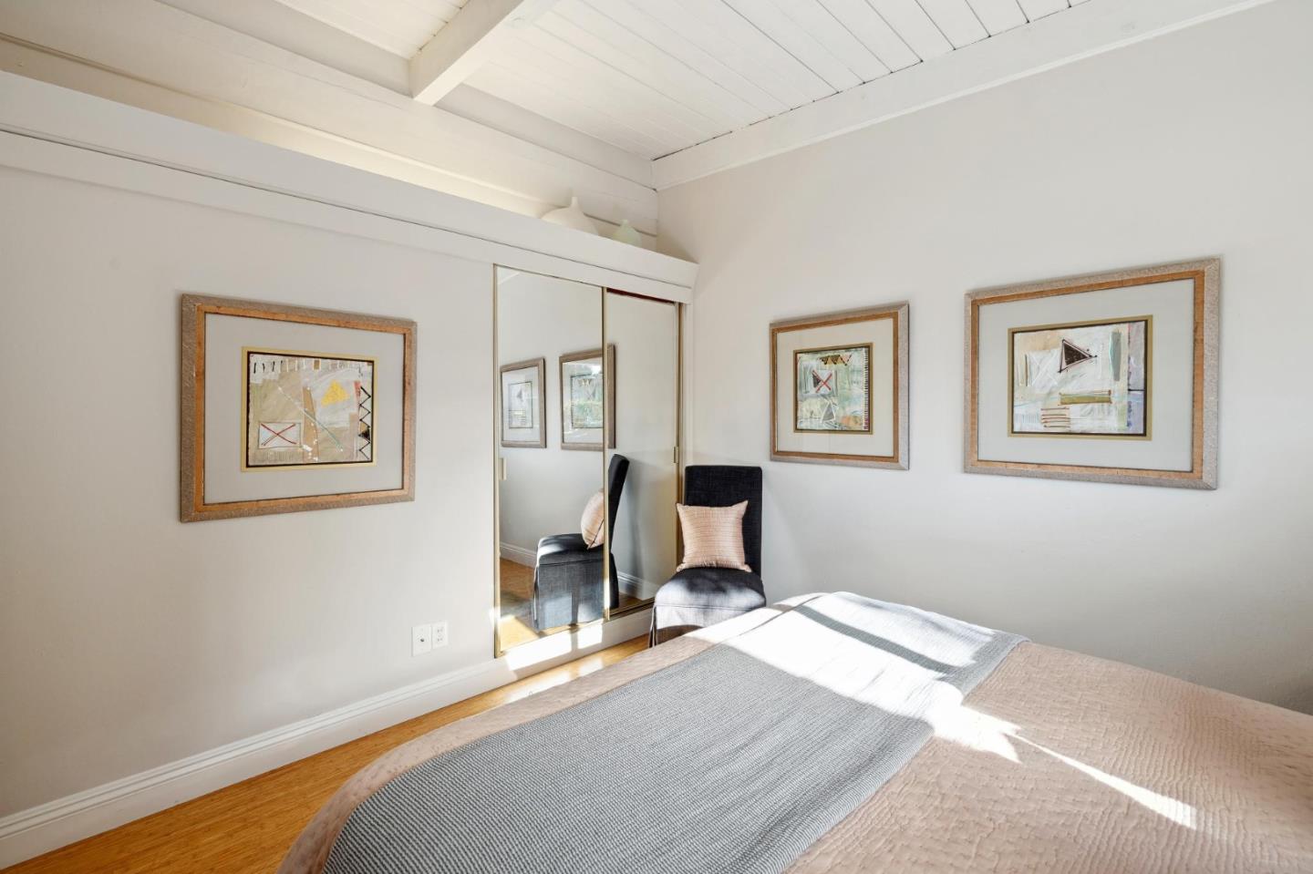 741 Emily Drive Mountain View, CA 94043 - Photo 17 of 30 a bedroom with bed and painting on the wall