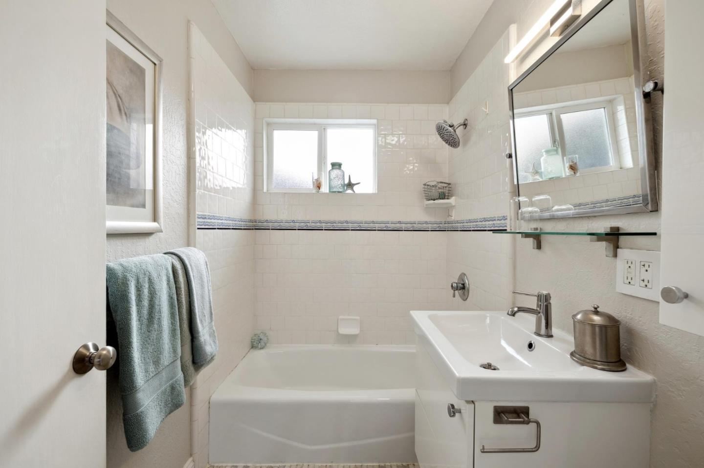 741 Emily Drive Mountain View, CA 94043 - Photo 19 of 30 a bathroom with a sink and a mirror