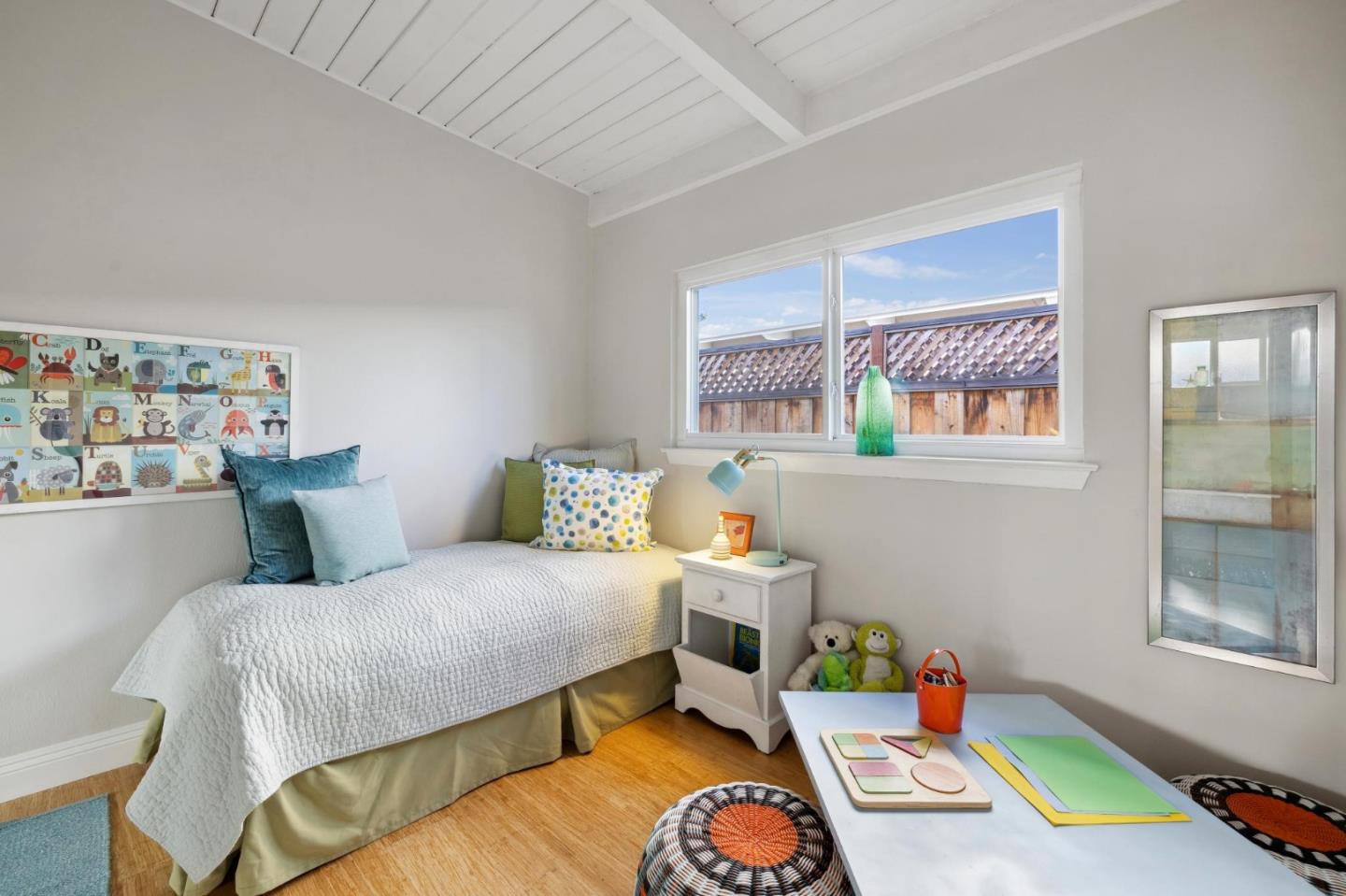 741 Emily Drive Mountain View, CA 94043 - Photo 20 of 30 a bedroom with a bed and a wooden floor