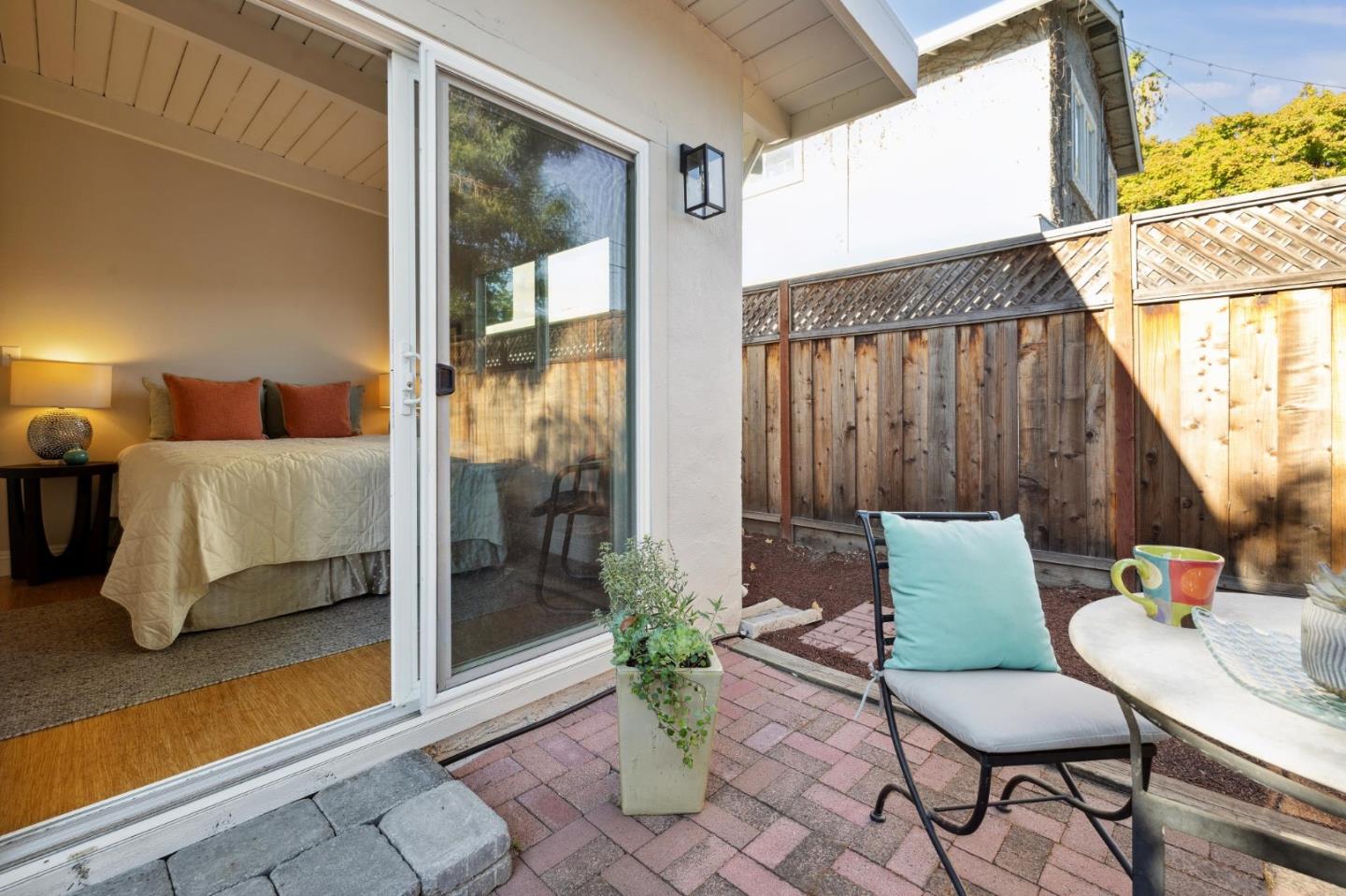 741 Emily Drive Mountain View, CA 94043 - Photo 24 of 30 a balcony with furniture and a potted plant