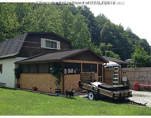 60 Five Mile Road Tad, WV 25201 - Photo 4 of 16 Exterior Back. screened porch