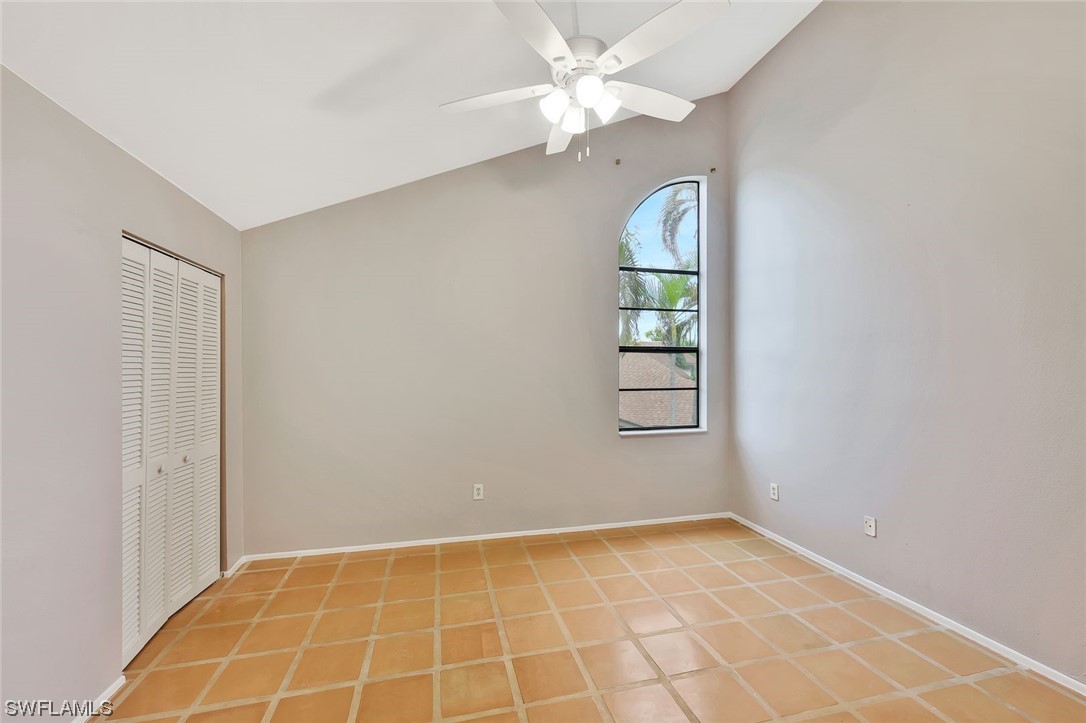 13373 Broadhurst Loop Fort Myers, FL 33919 - Photo 16 of 25 an empty room with windows and fan