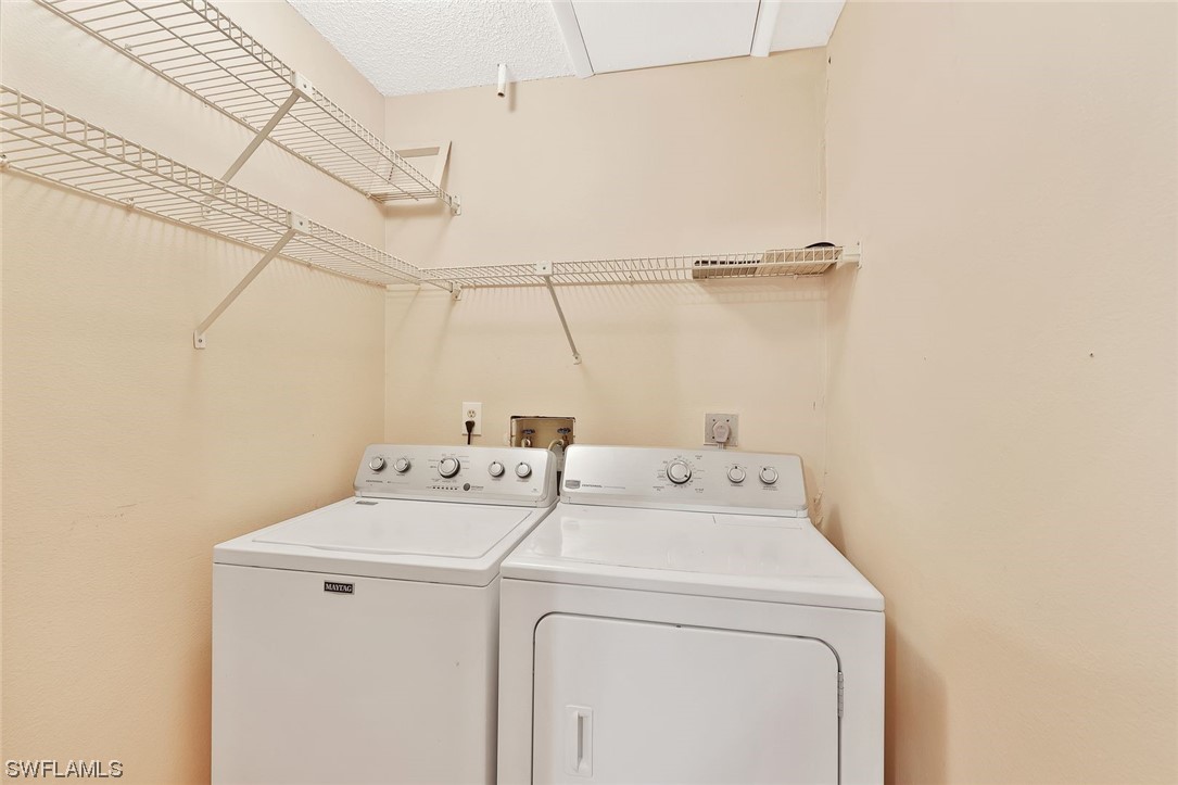13373 Broadhurst Loop Fort Myers, FL 33919 - Photo 18 of 25 a utility room with dryer and washer