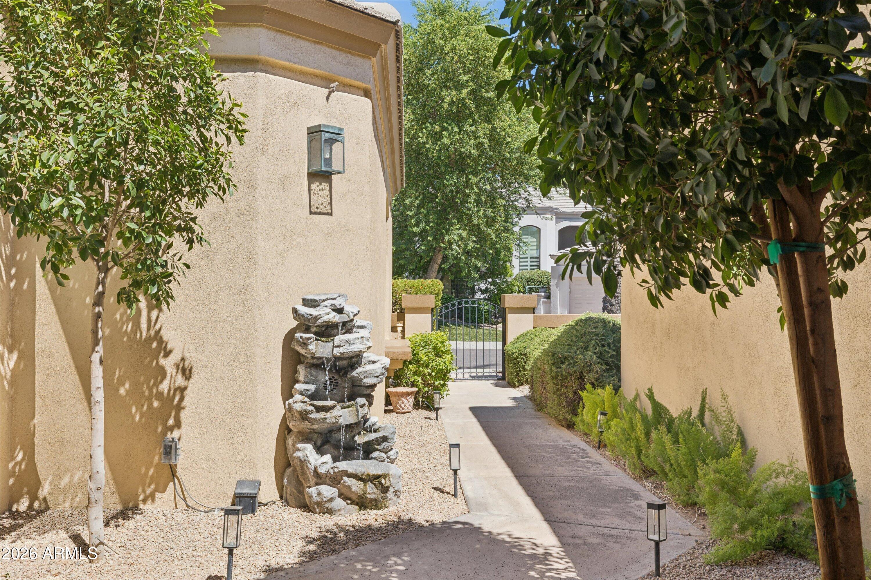 7323 East Gainey Ranch Road, Unit 18 Scottsdale, AZ 85258 - Photo 10 of 90 front walkway