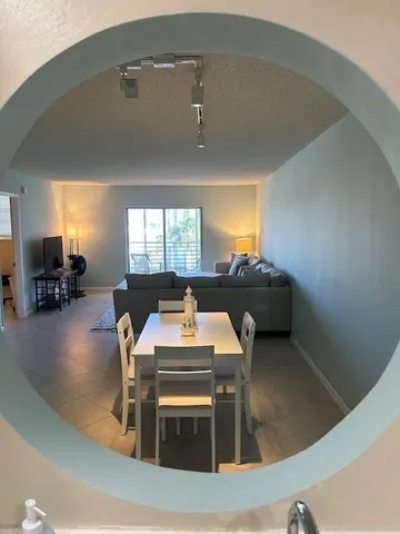 a kitchen with a sink and a stove